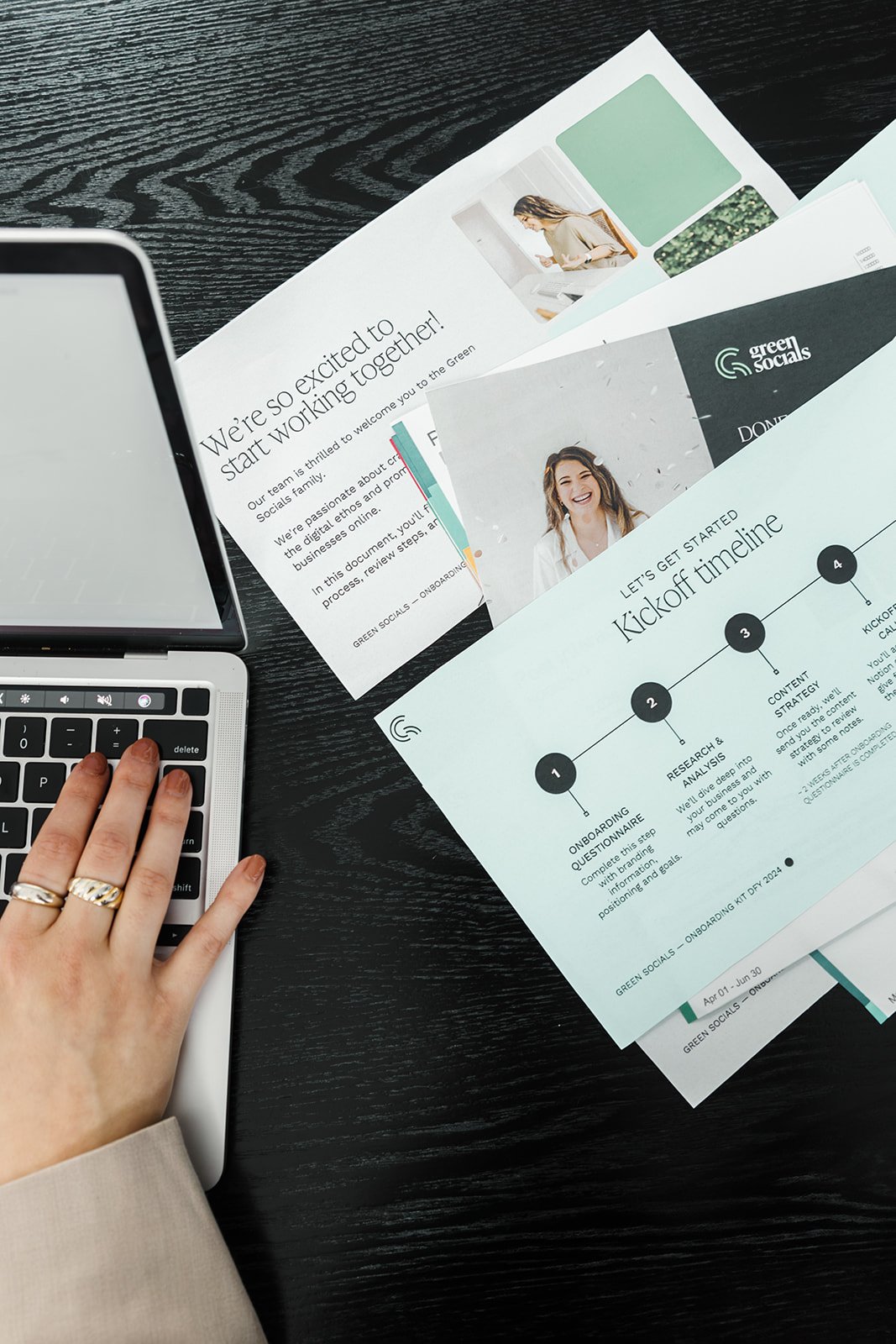 Social media strategist and small business owner reviewing content plan together