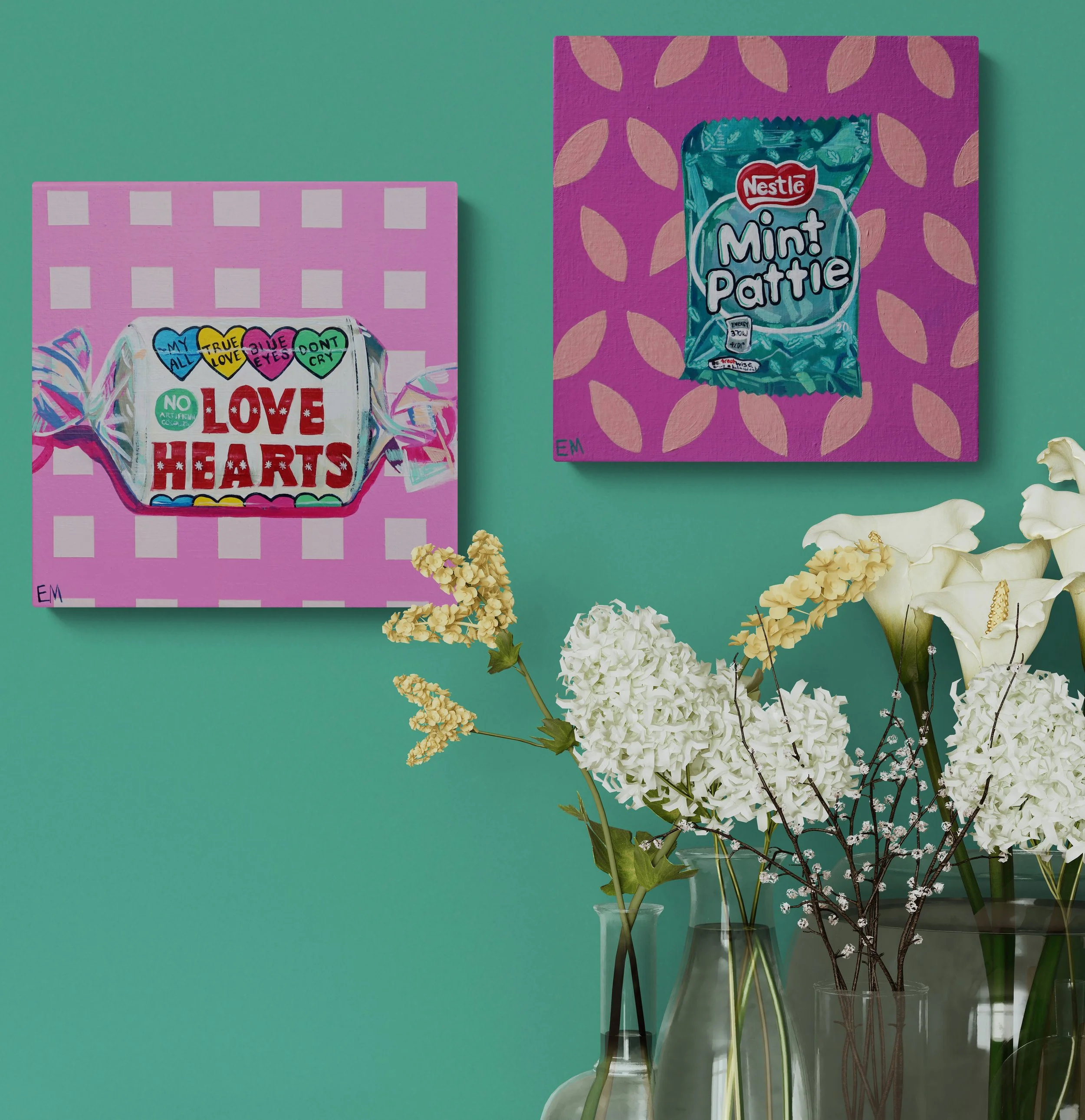 two pink candy paintings hang on aqua wall with flowers love hearts and mint pattie