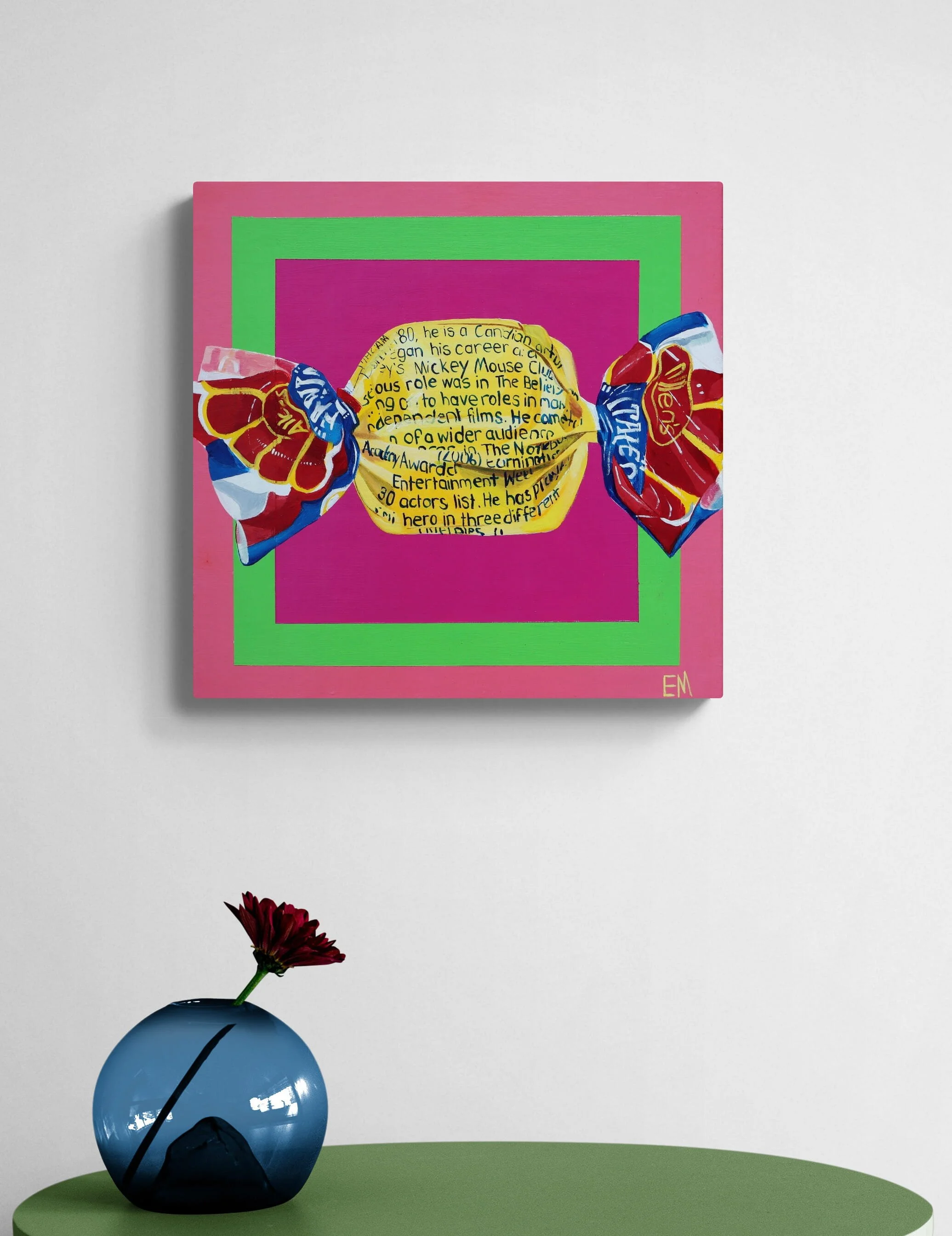 pink and green Fantale painting displayed on cream wall with blue decor