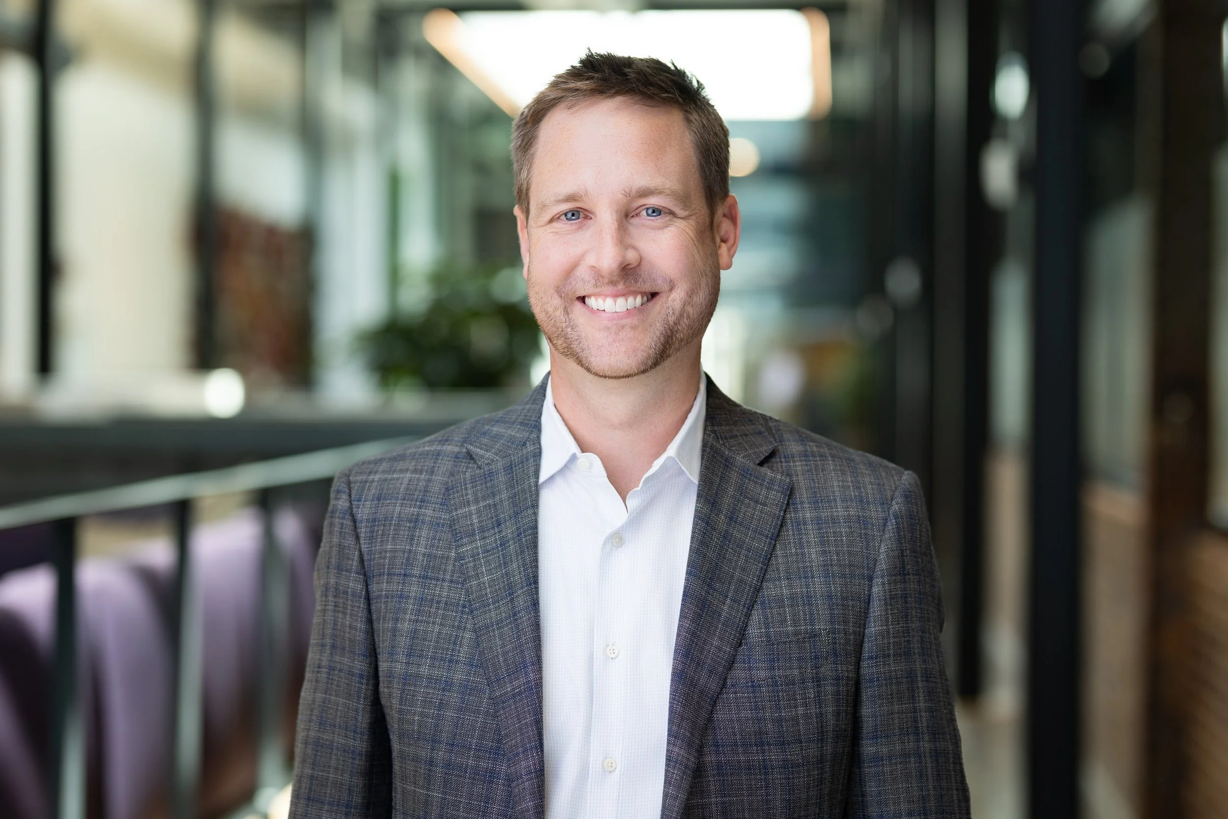 Professional environmental headshot of Omaha lawyer 