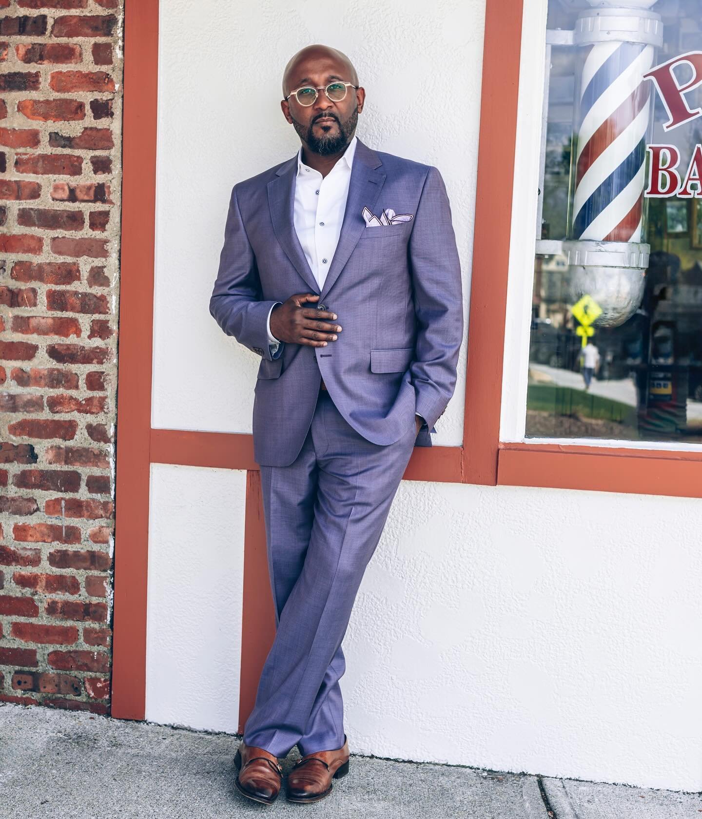 What better reason to wear color, than Spring? 

How to do it with this much effortless polish, you ask?

Let the color be the hero. 

Our lavender sharkskin only needed subtle accessorizing. 

White dress shirt with blue buttons
A lavender &amp; egg