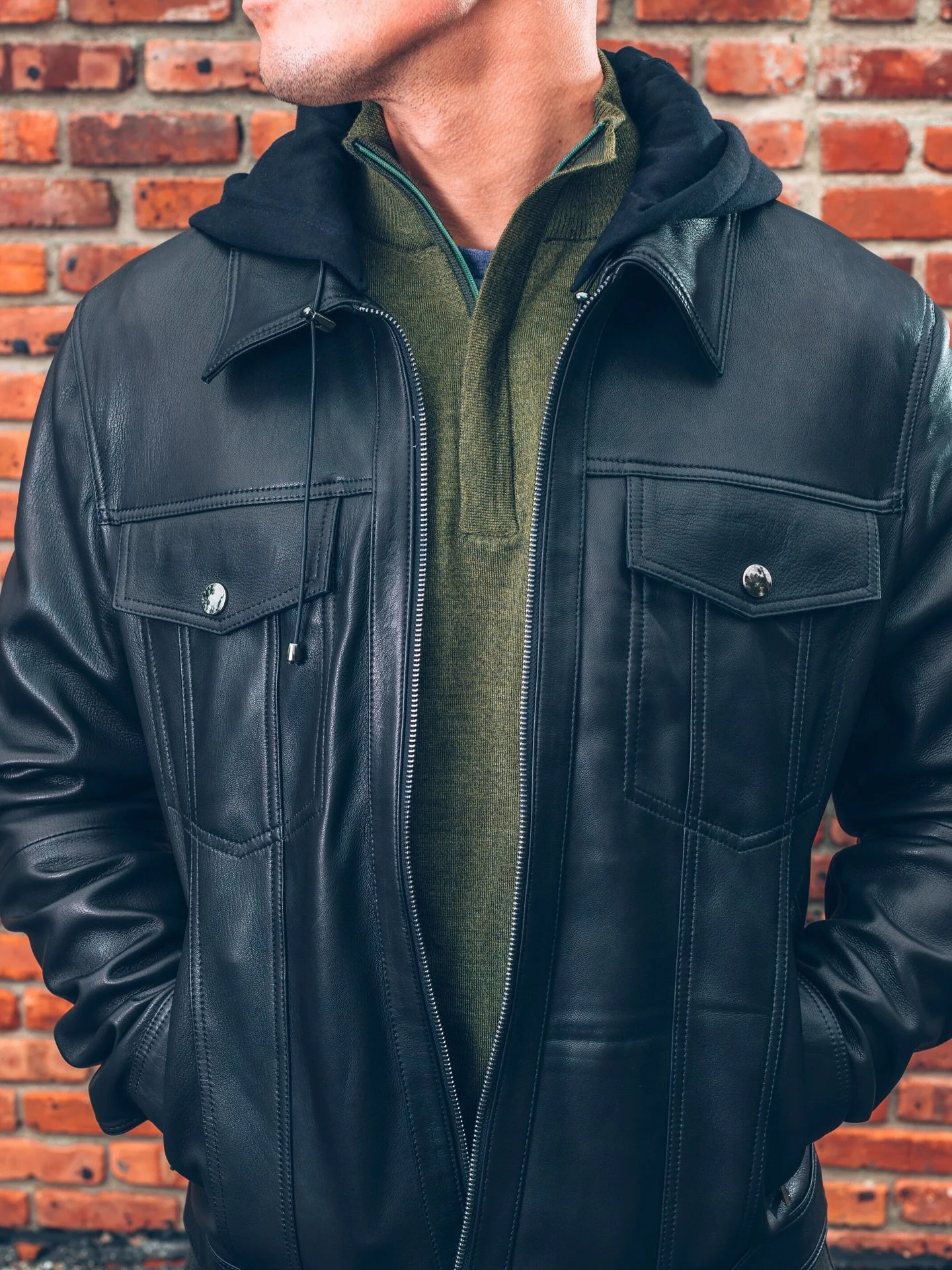 Classic cool. Season after season. 

Lambskin leather, silken lining, and a removable hood. The kind of details that make this jacket an instant essential. 

Paired here with an olive three-quarter zip for an easy, laid-back fall look. 

In store now