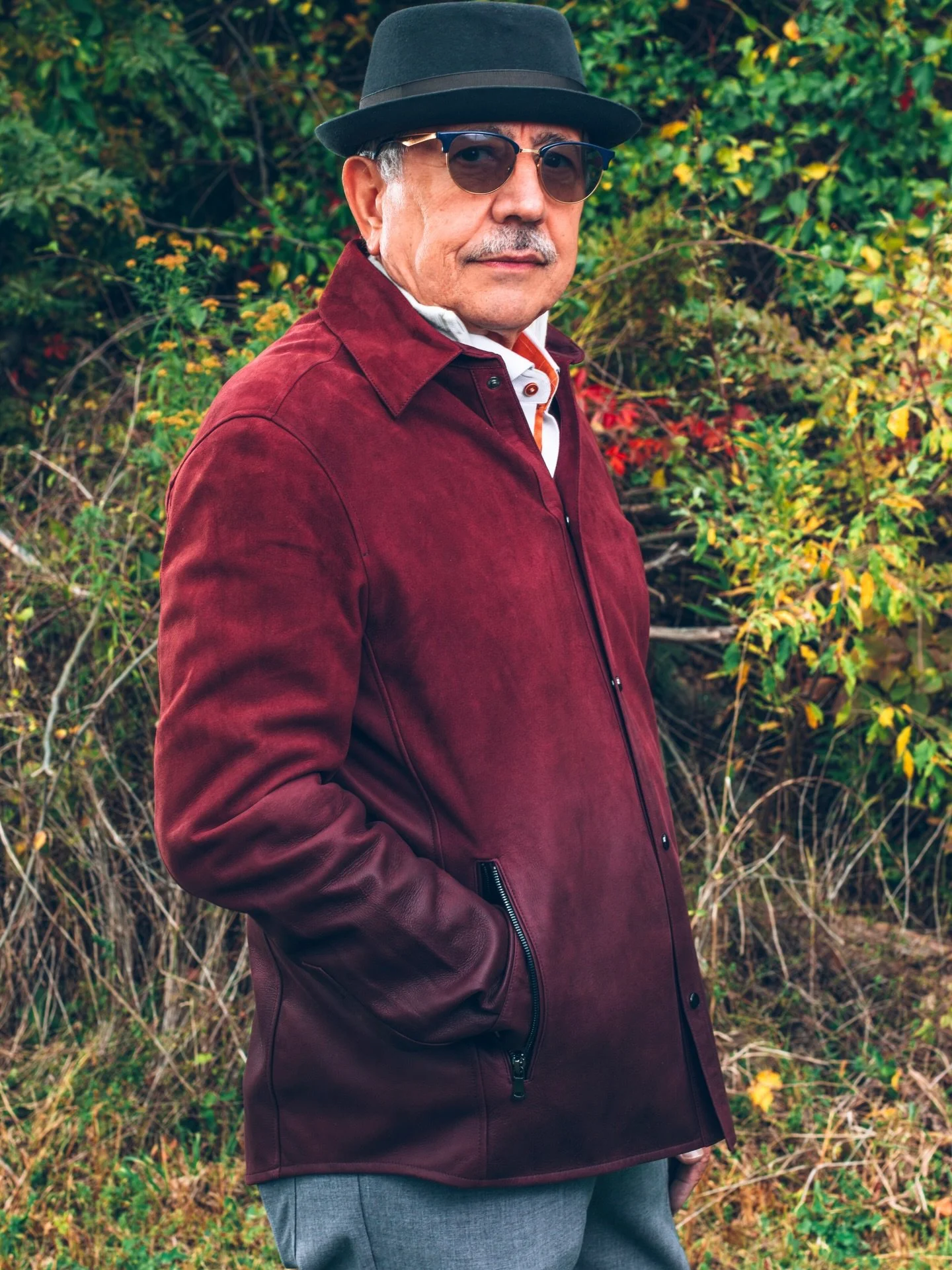 Our ombr&eacute; lambskin &amp; suede overshirt is a buttery-soft blend of texture and tone.

Burgundy suede gives way to a bordeaux leather and jet black accents. 

Light enough to layer, and distinct enough to stand on its own. 

Swipe for the deta