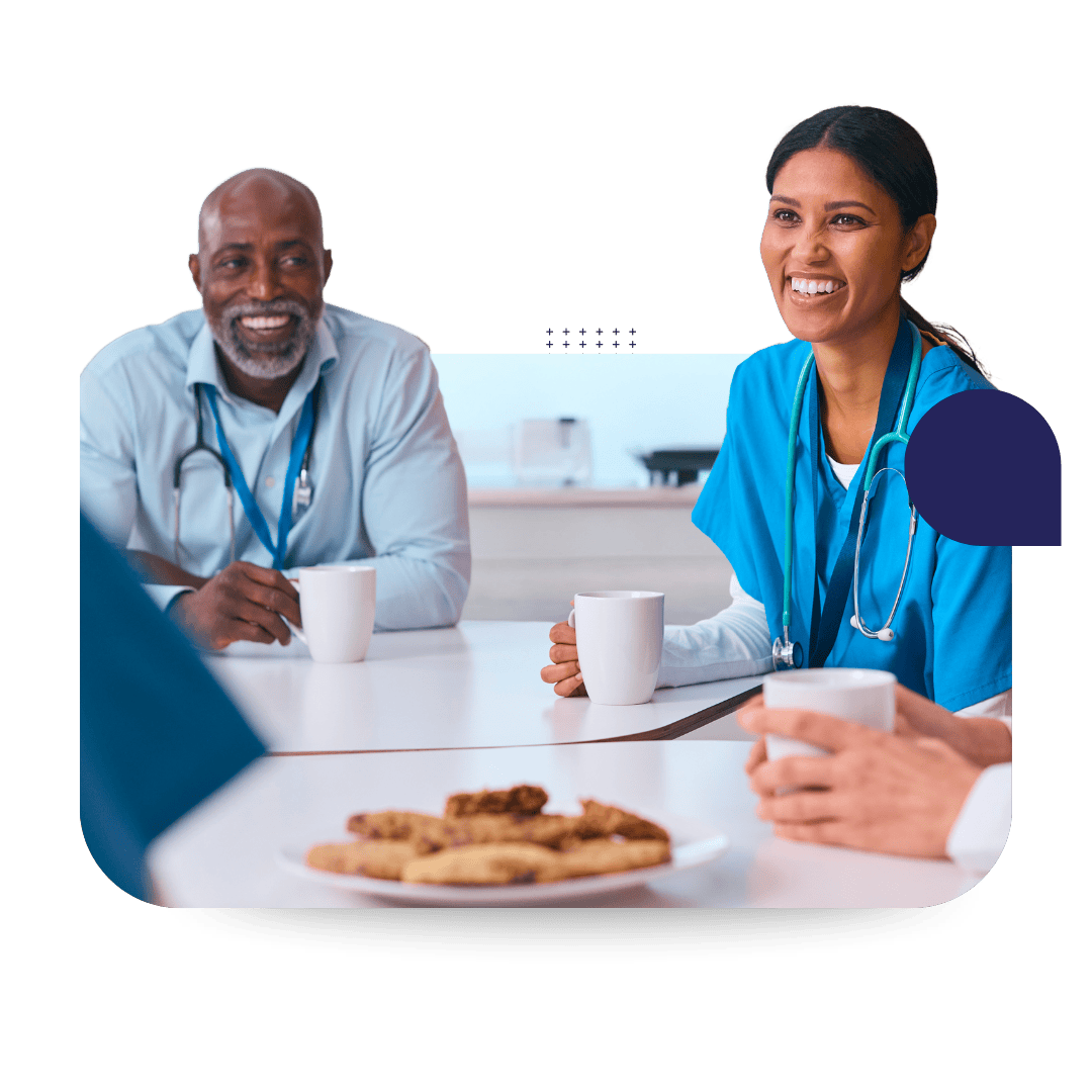 health practitioners having a meeting with coffee and cookies