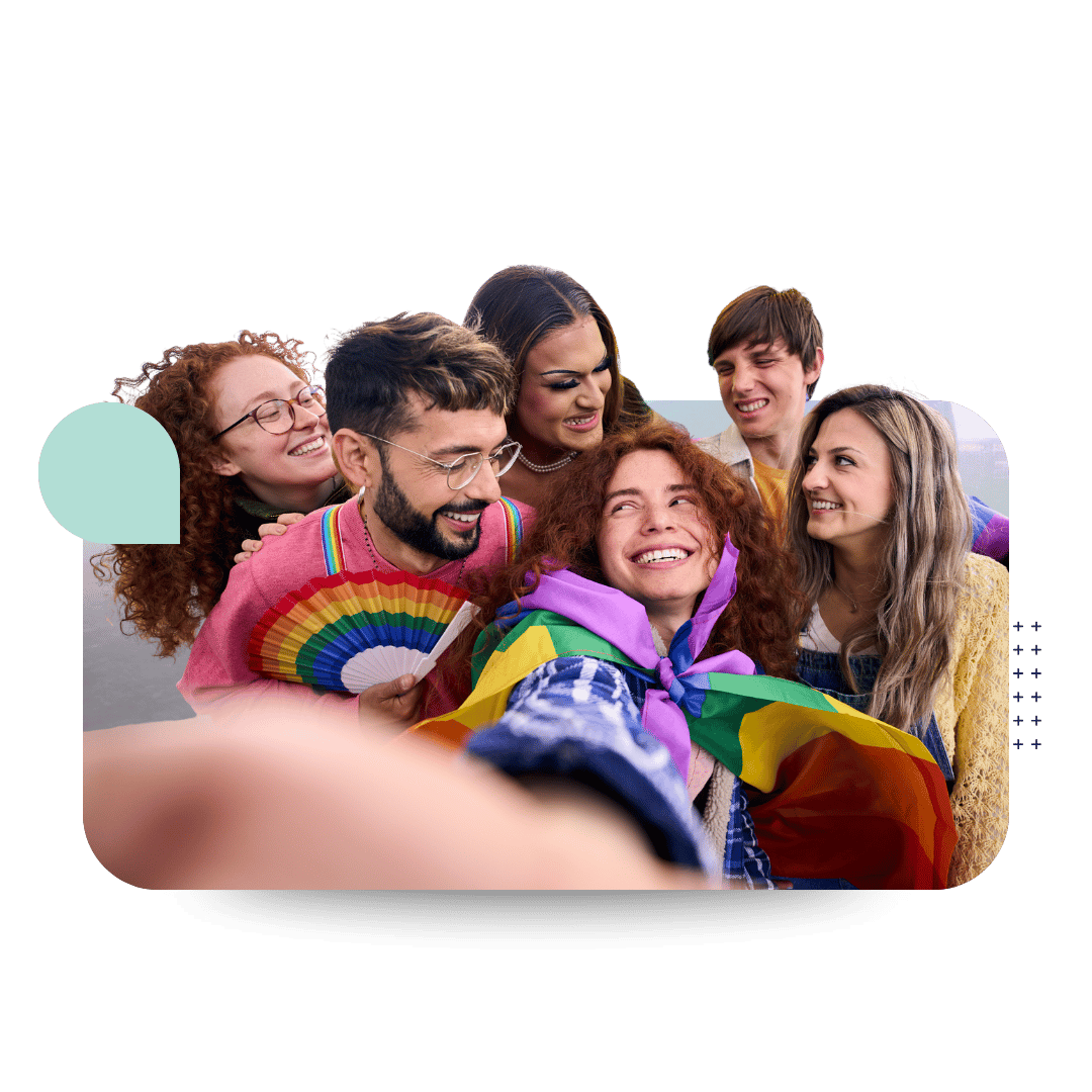 A group of diverse people celebrating Pride