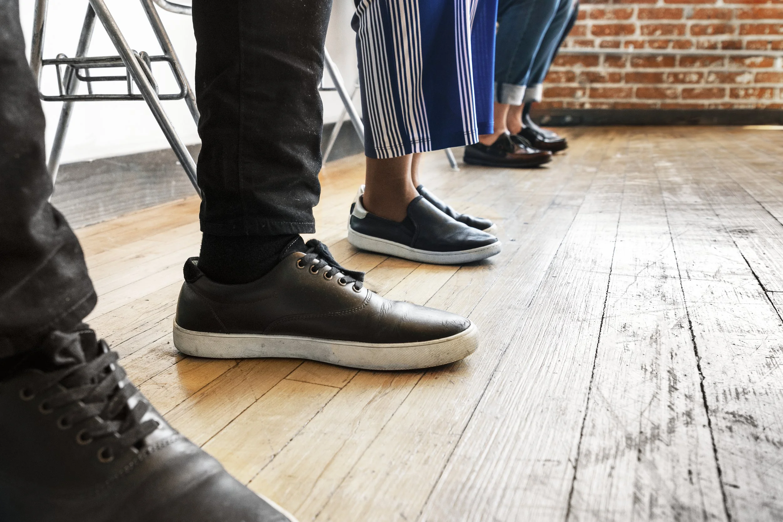 people at work, focus on their shoes