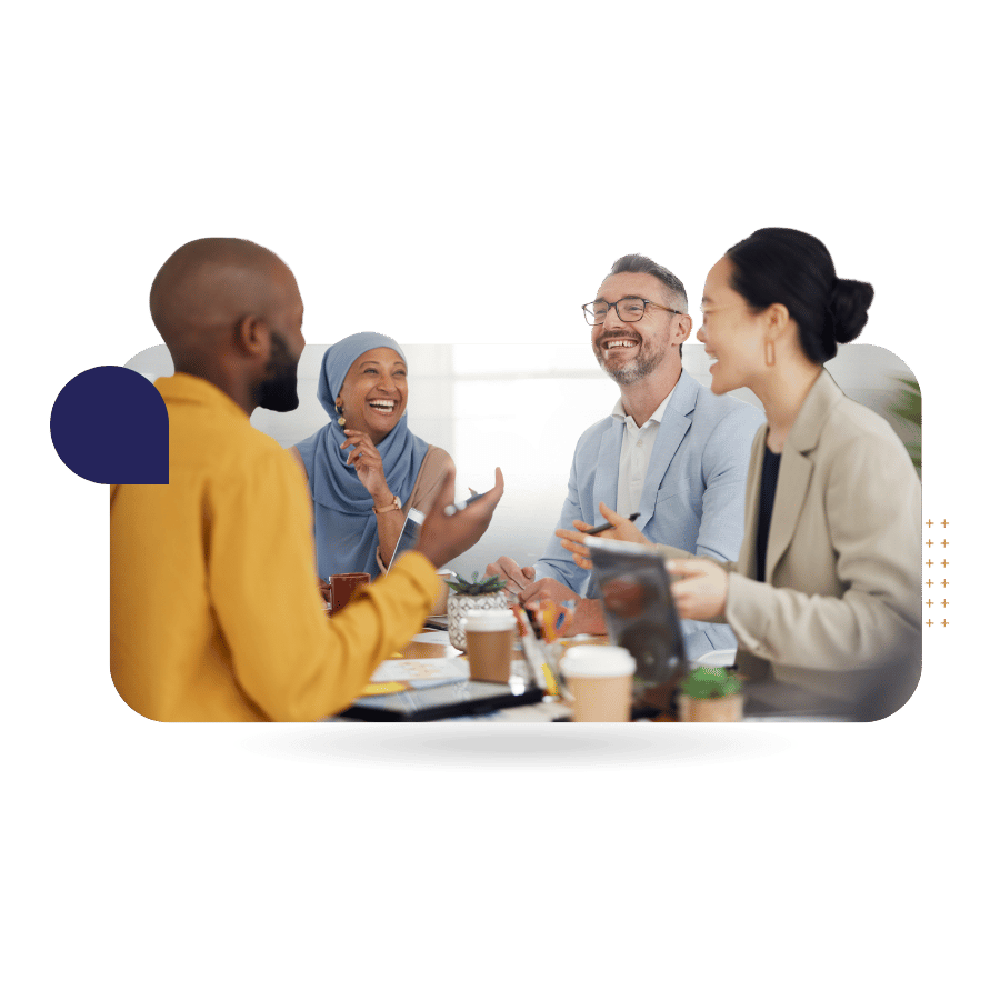 Image of colleagues in an in person training session with CultureAlly