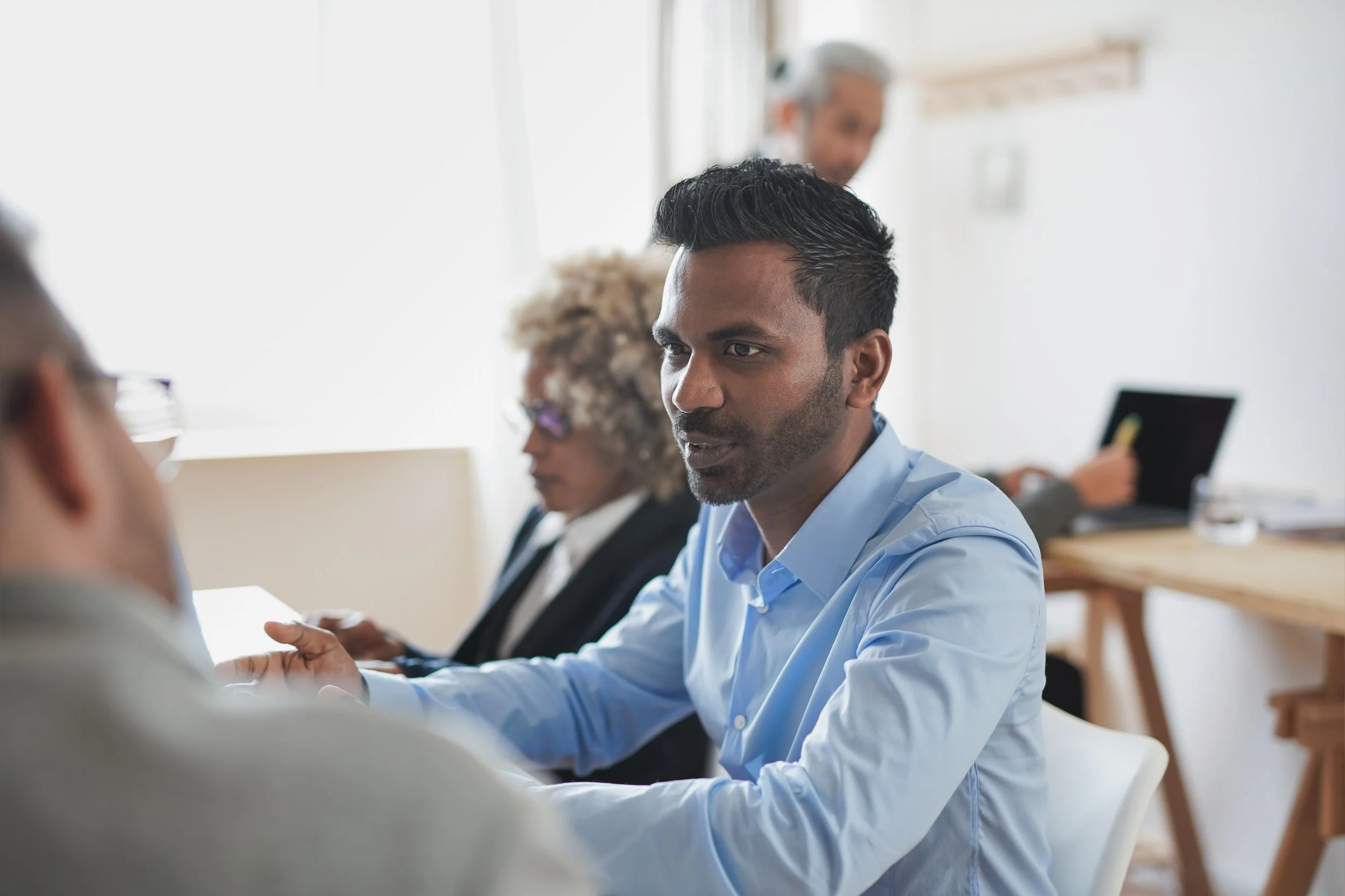 Person in discussion at work