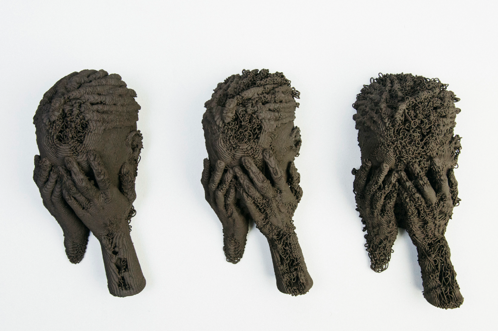 enorê, Self-iteration in 3 steps | High-fired stoneware ceramic, 2024 - These works begin with scans of the artist’s own body, translated between digital data and clay. Rather than producing stable copies, each iteration introduces shifts, distortion