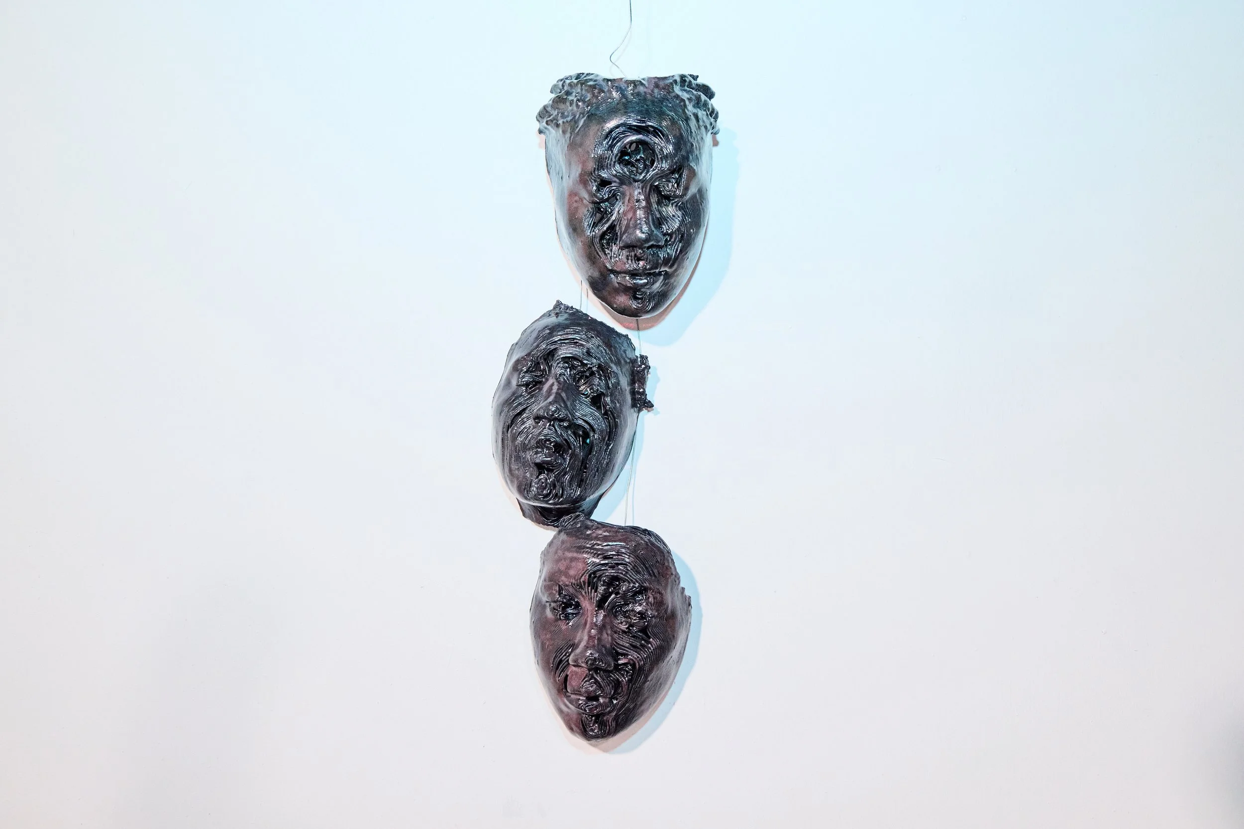 enorê, Untitled (aparição), from body reconstructions | Glazed stoneware ceramic, wire, 2025 - These works begin with scans of the artist’s own body, translated between digital data and clay. Rather than producing stable copies, each iteration introd