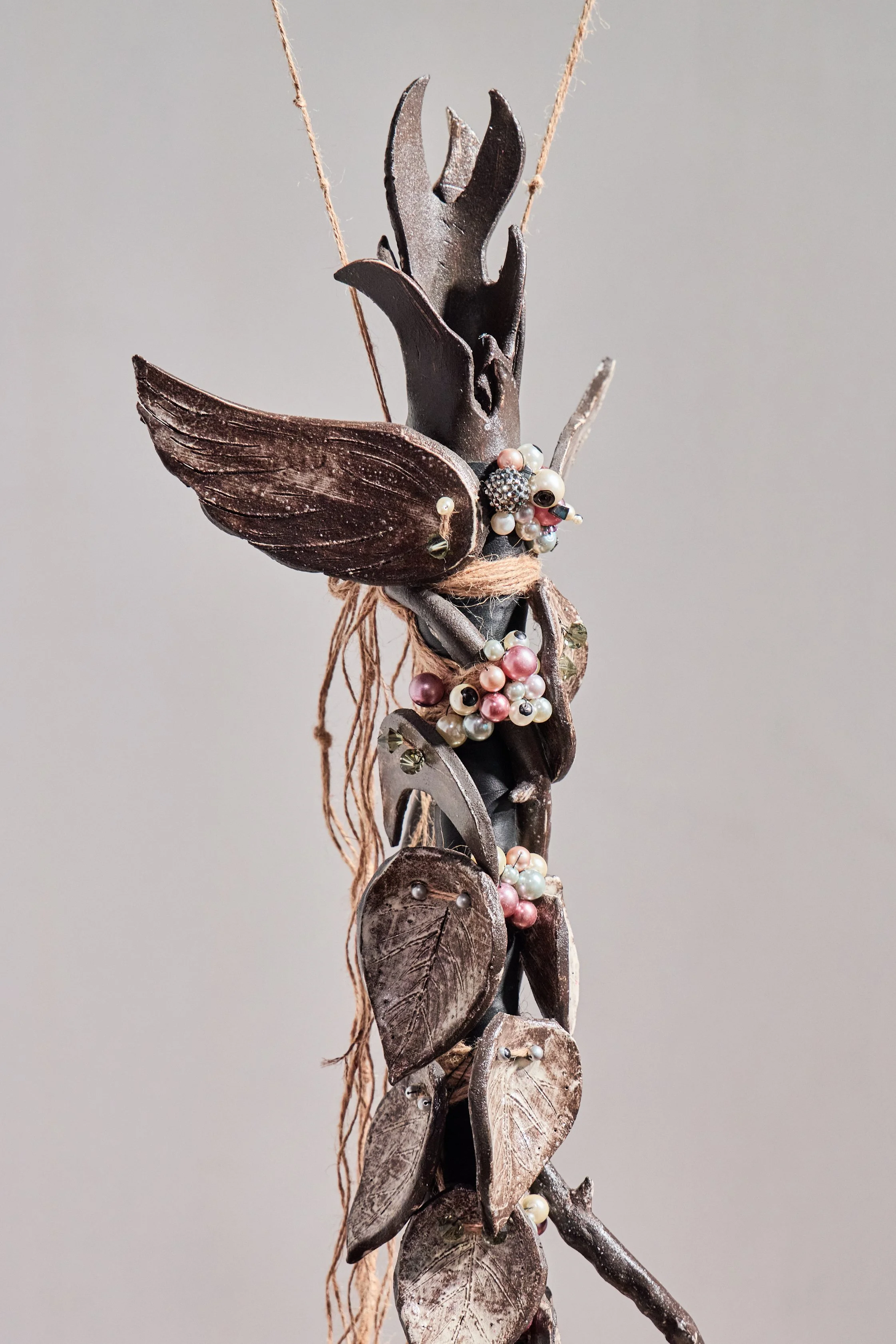 Elena Saraceni
Sigilaria | Wood, black clay, white slip, quilted leather, embroidery, acrylic fibre, found objects, 2026 - The title Sigilaria refers to small figurines historically exchanged during the Roman festival of Saturnalia: modest objects of