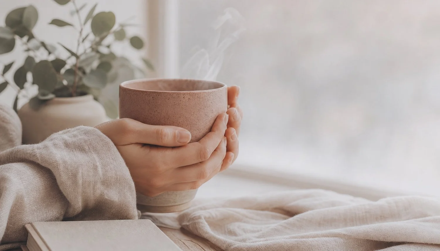 Grounding - hands warming around a hot drink, a nervous system settling