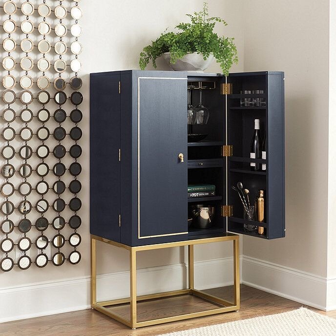  The Harper Campaign Bar from  Ballard Designs . I love that this cabinet has a crazy amount of storage and that everything is hidden. 