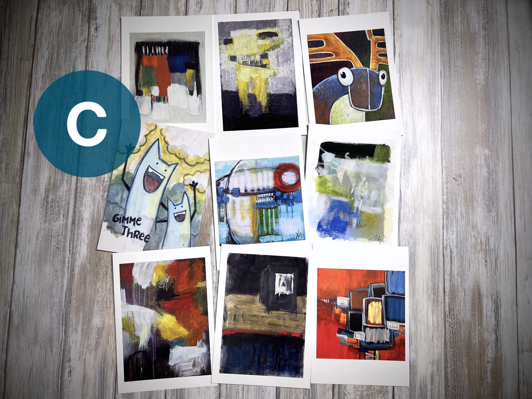 Click the photo to open a wider image of these postcard sets.