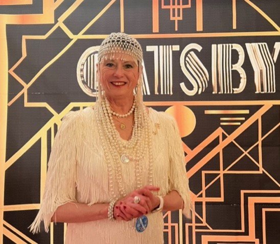 Gatsby Gal Barbara Burwell won the contest for her bees knees look.