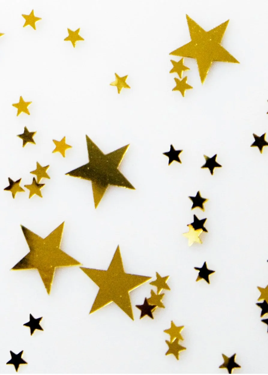 Close up of gold stars symbolizing gold standard, research validated psychological assessment tools and clinically rigorous evaluation practices.