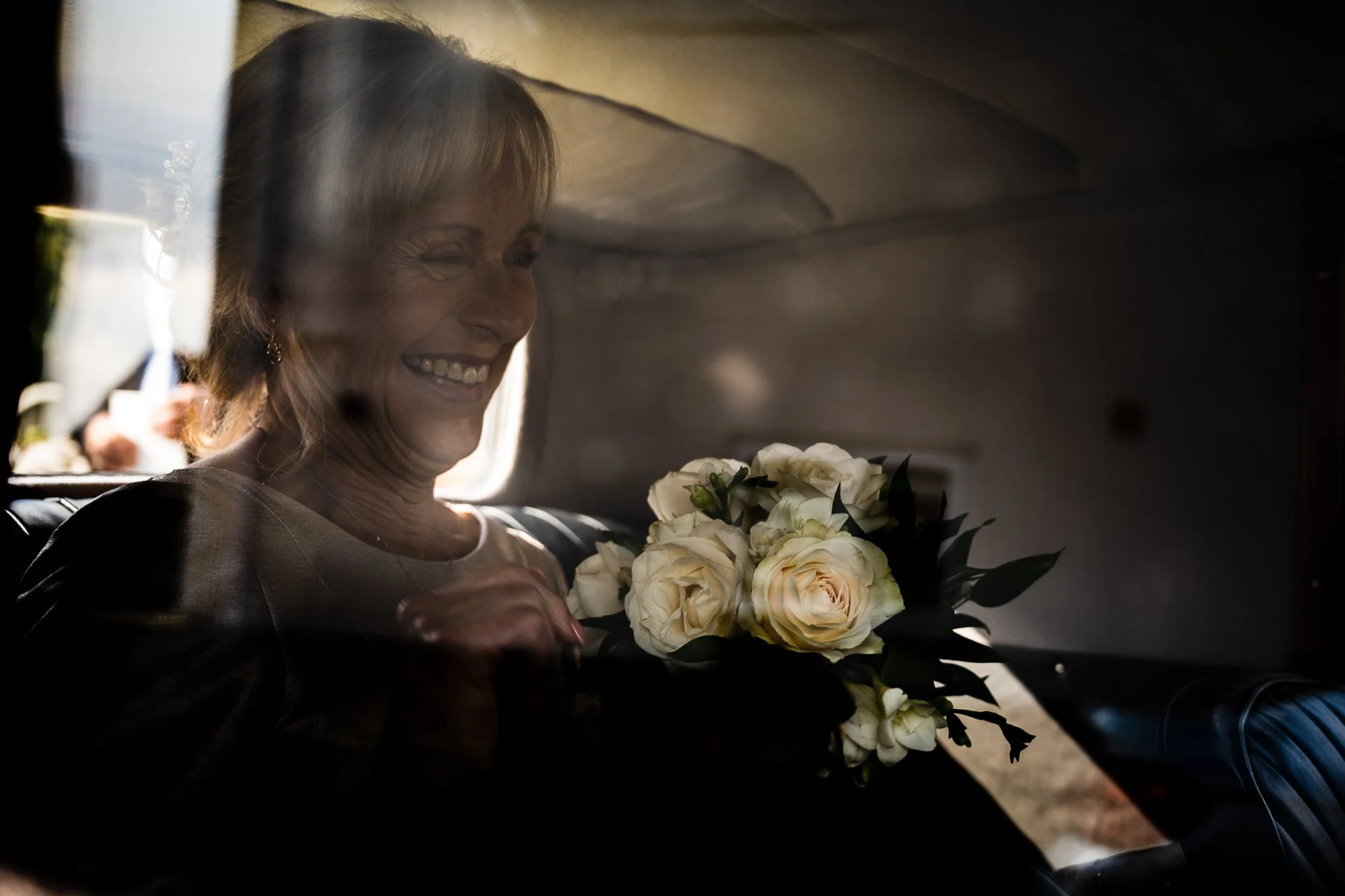 Bride in wedding car