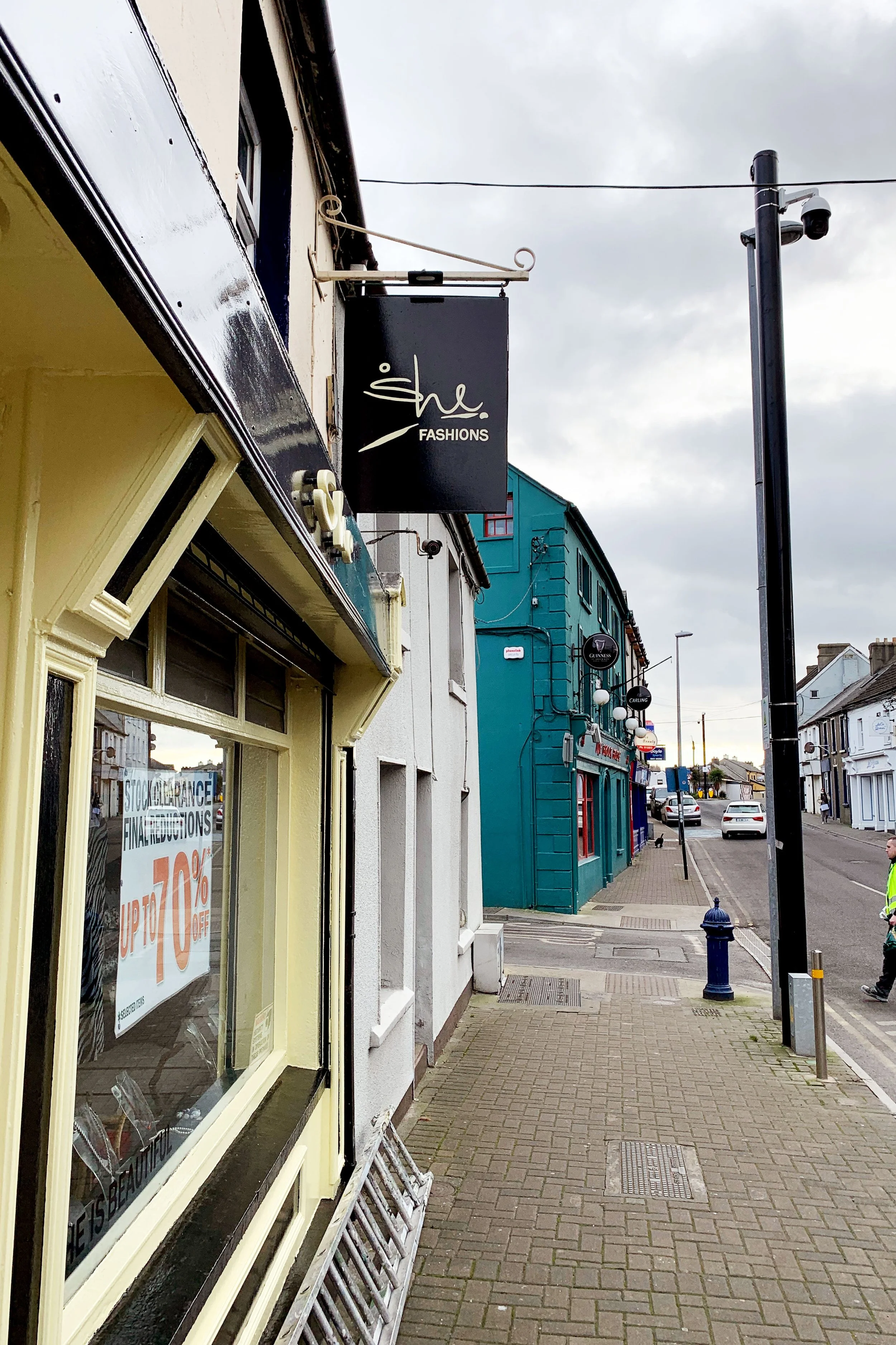 Branded sign writing featuring the clothes shop "She" logo, Arklow, County Wicklow.