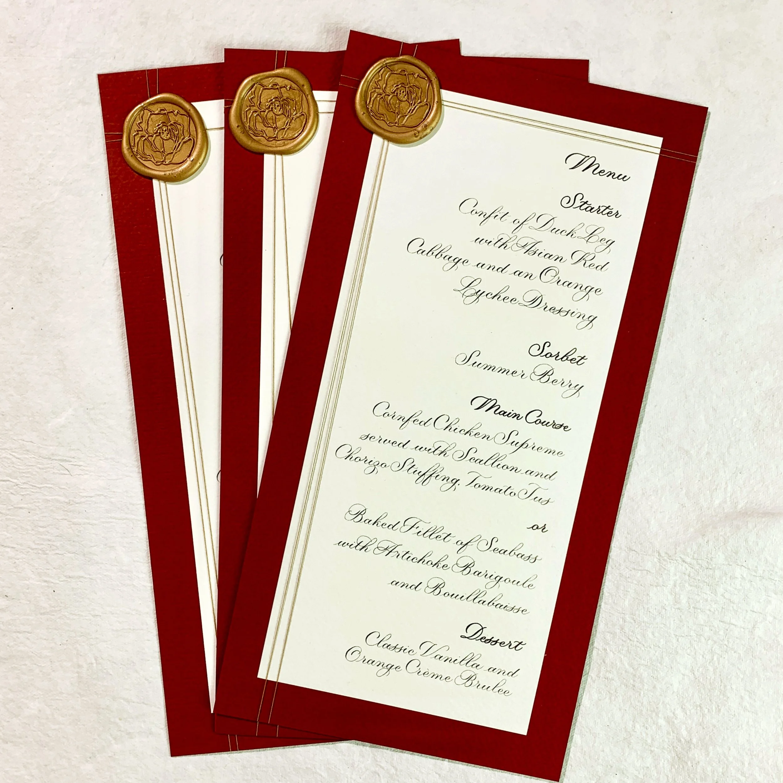 Burgundy-Menus-with-Stamp-and-Thread-x3.jpg