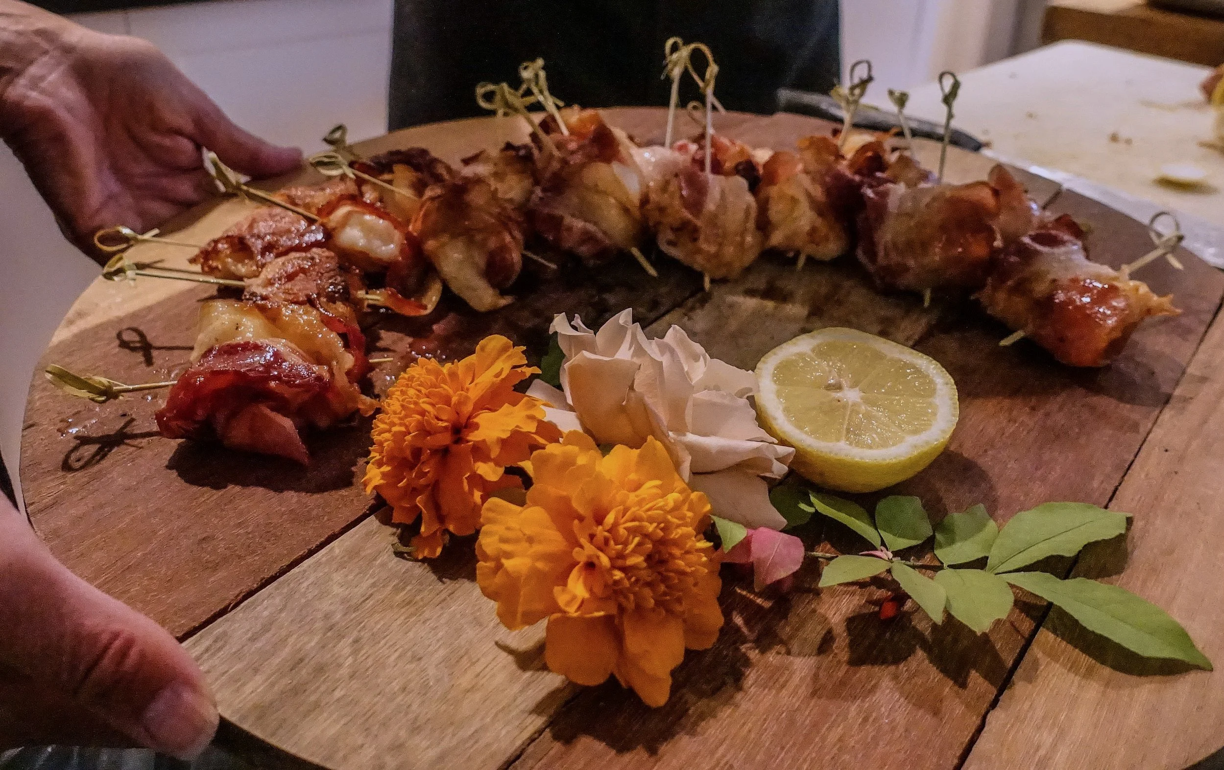 Charcoal bacon-wrapped shrimp appetizer,