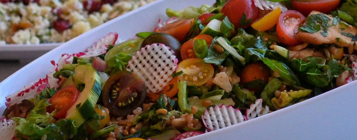 Fresh salad displayed at catered buffet service