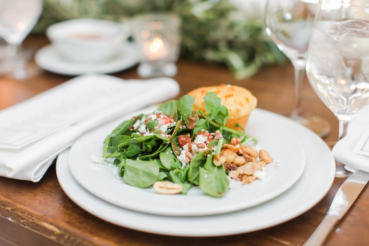 Plated watercress salad with candied nuts, catering service