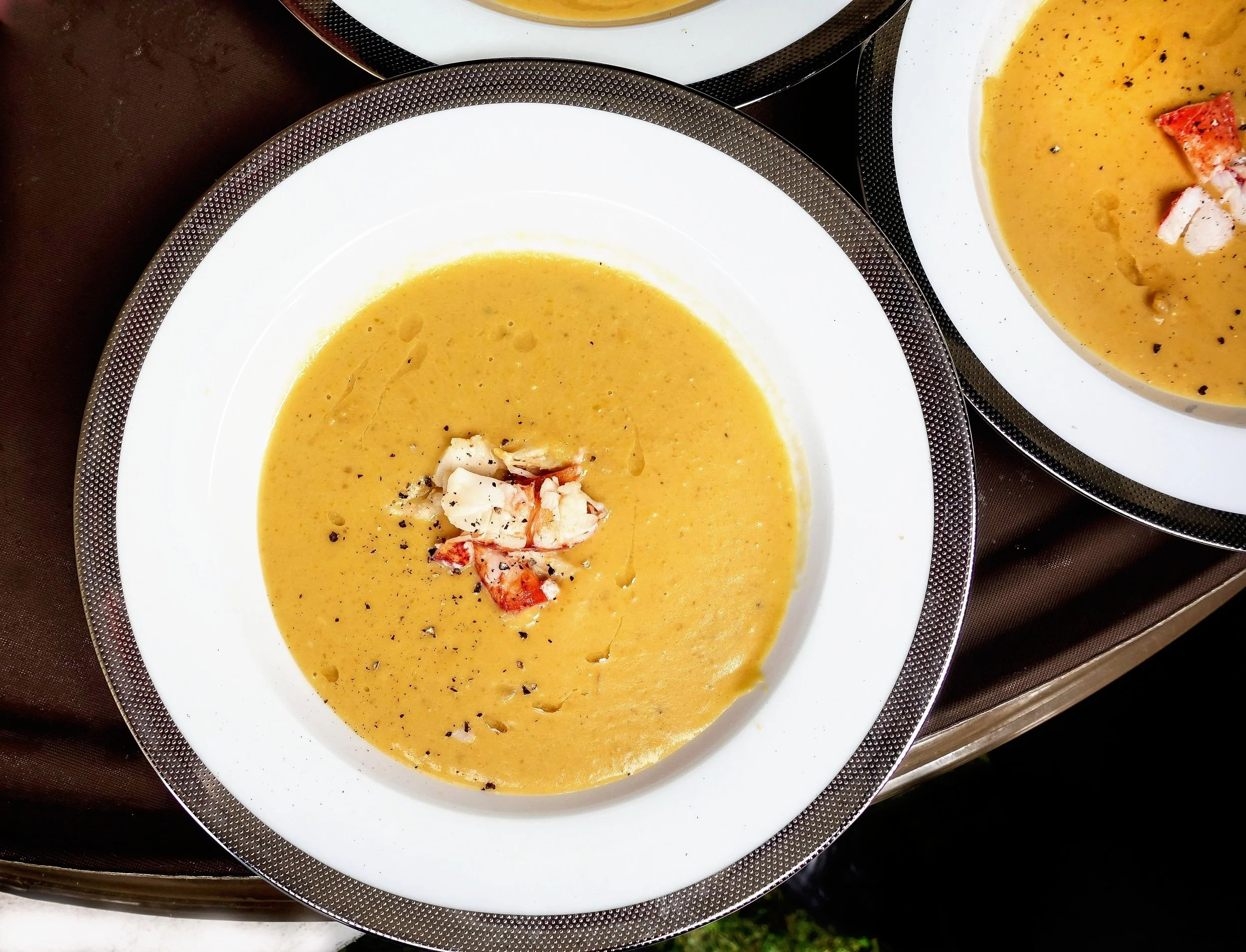 Butternut squash soup with lobster, plated course catering service