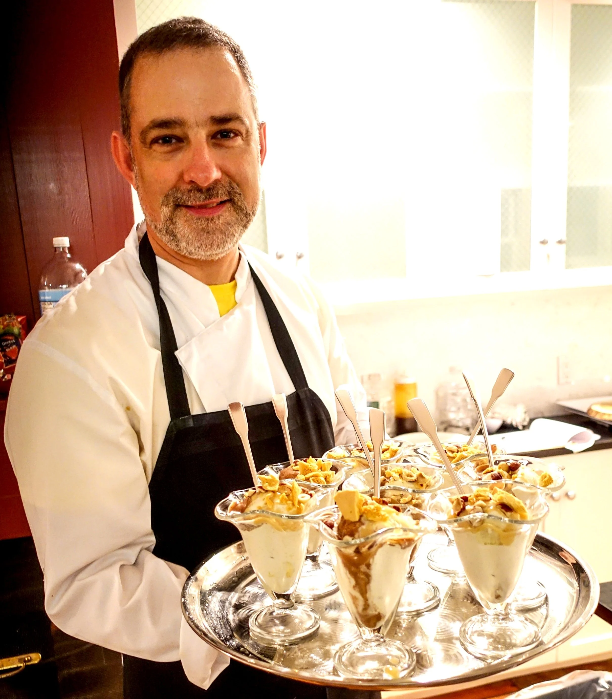 Chef serving custom caramel honeycomb dessert, catering service