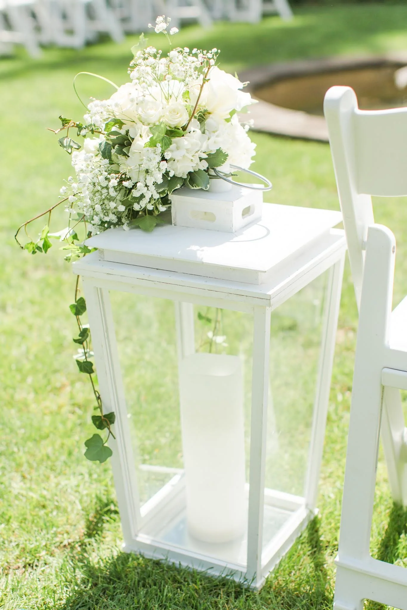 Summer garden wedding staging with floral decor