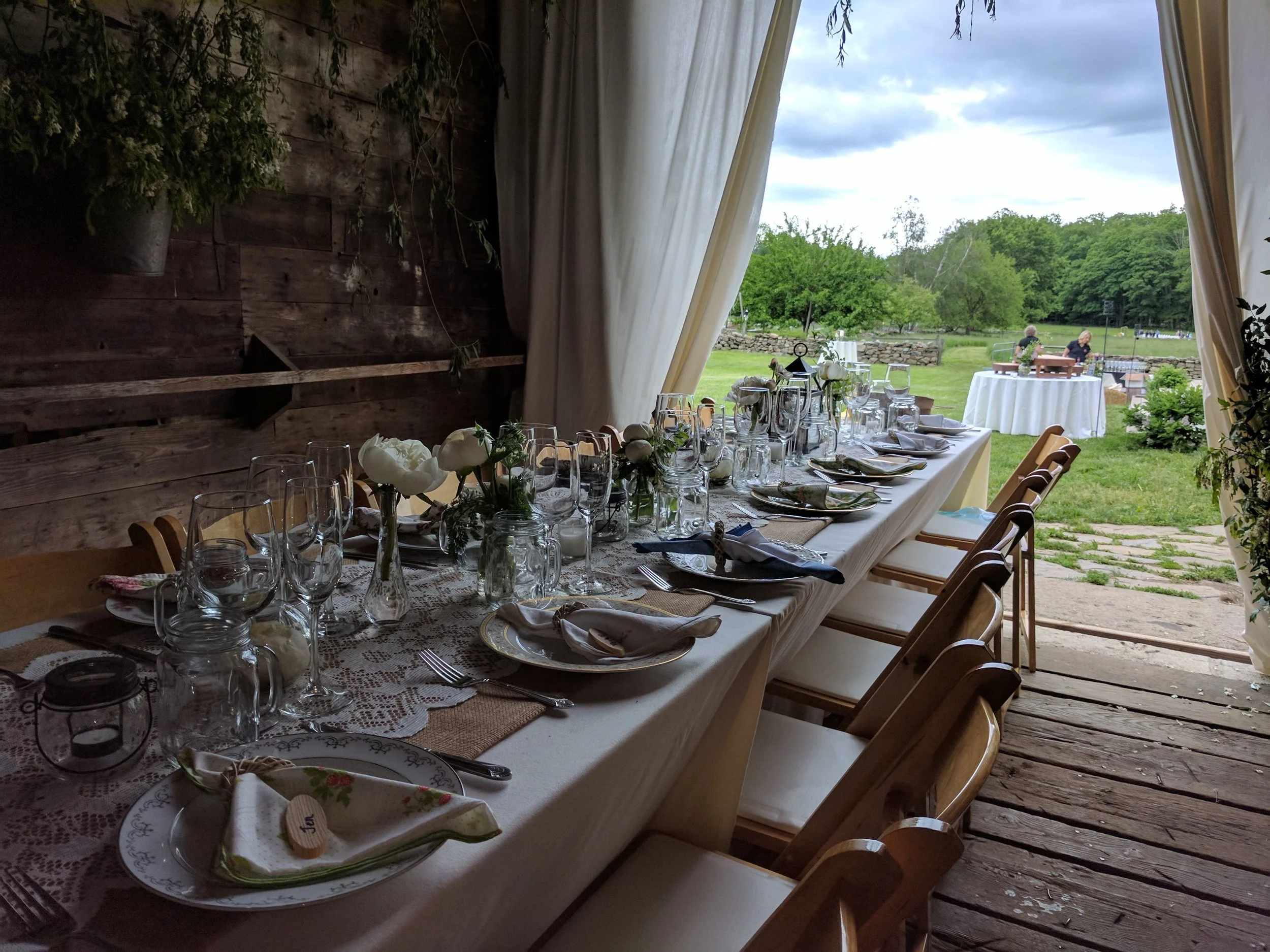 Outdoor wedding dinner table with scenic views