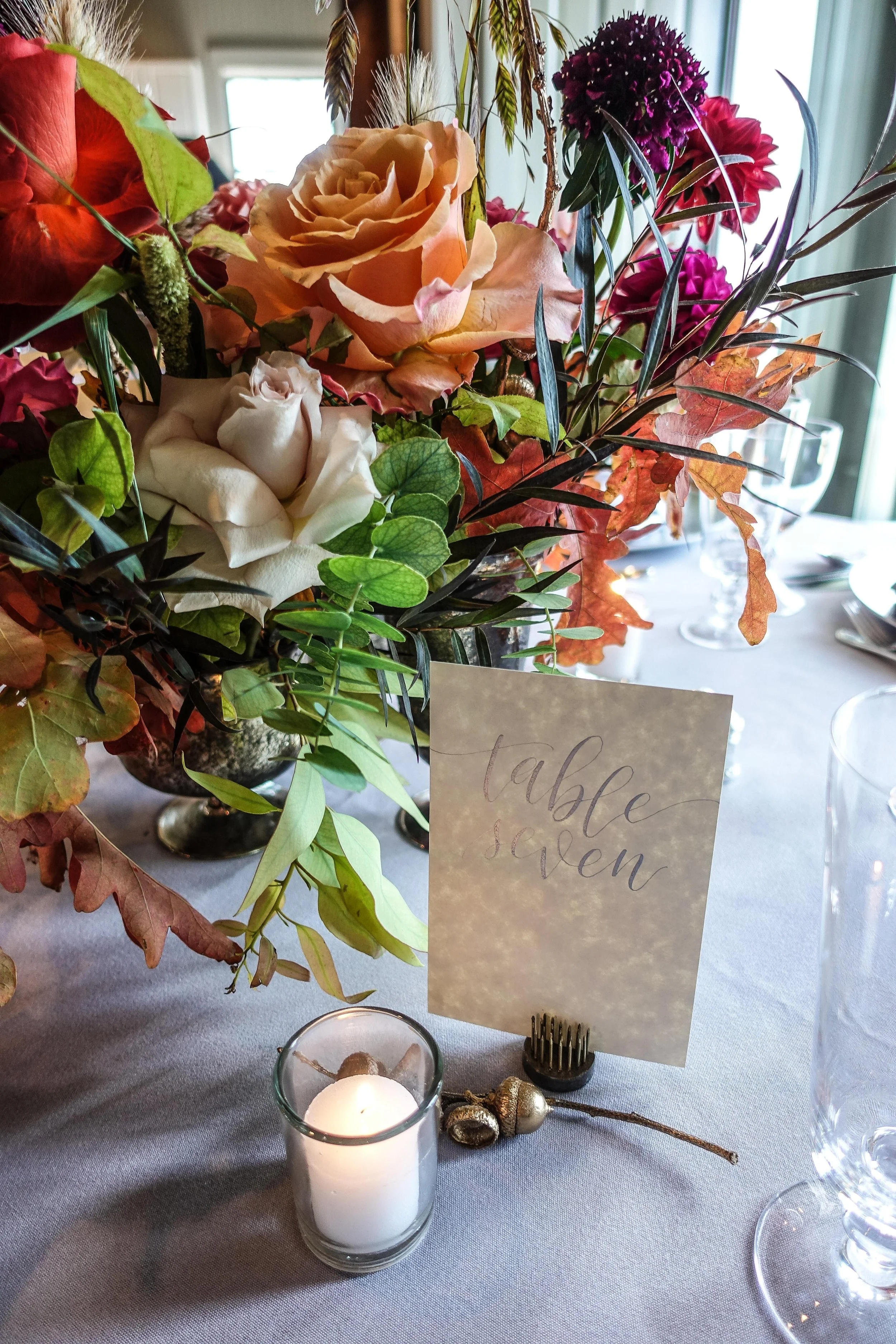 Votive candle and table card wedding decor