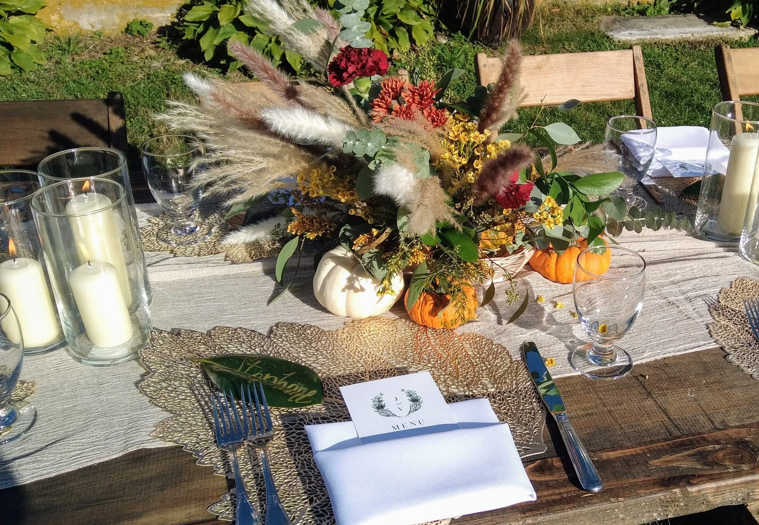 Outdoor wedding centerpiece with dried florals