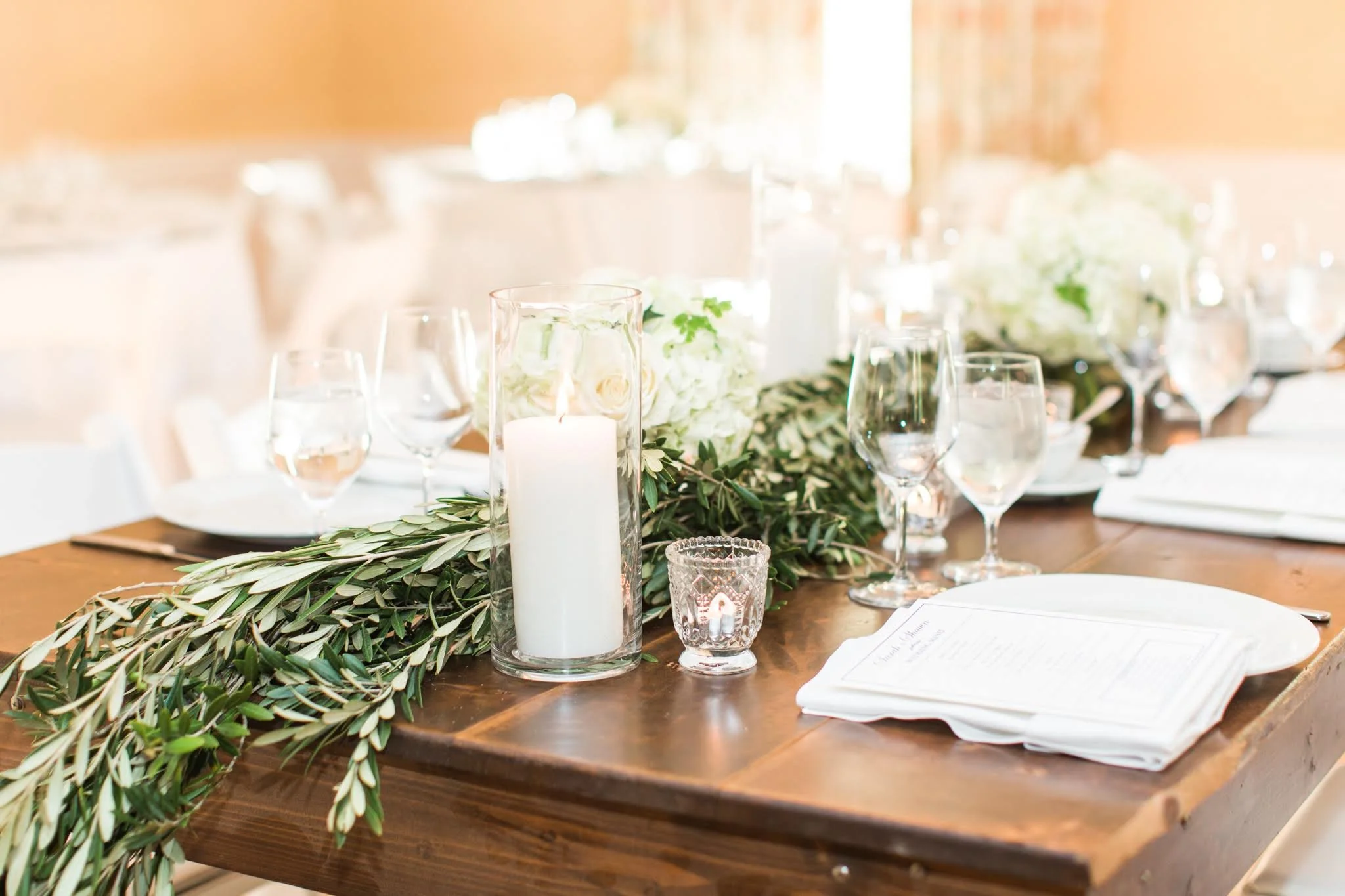 Simple laurel greenery wedding table centerpiece