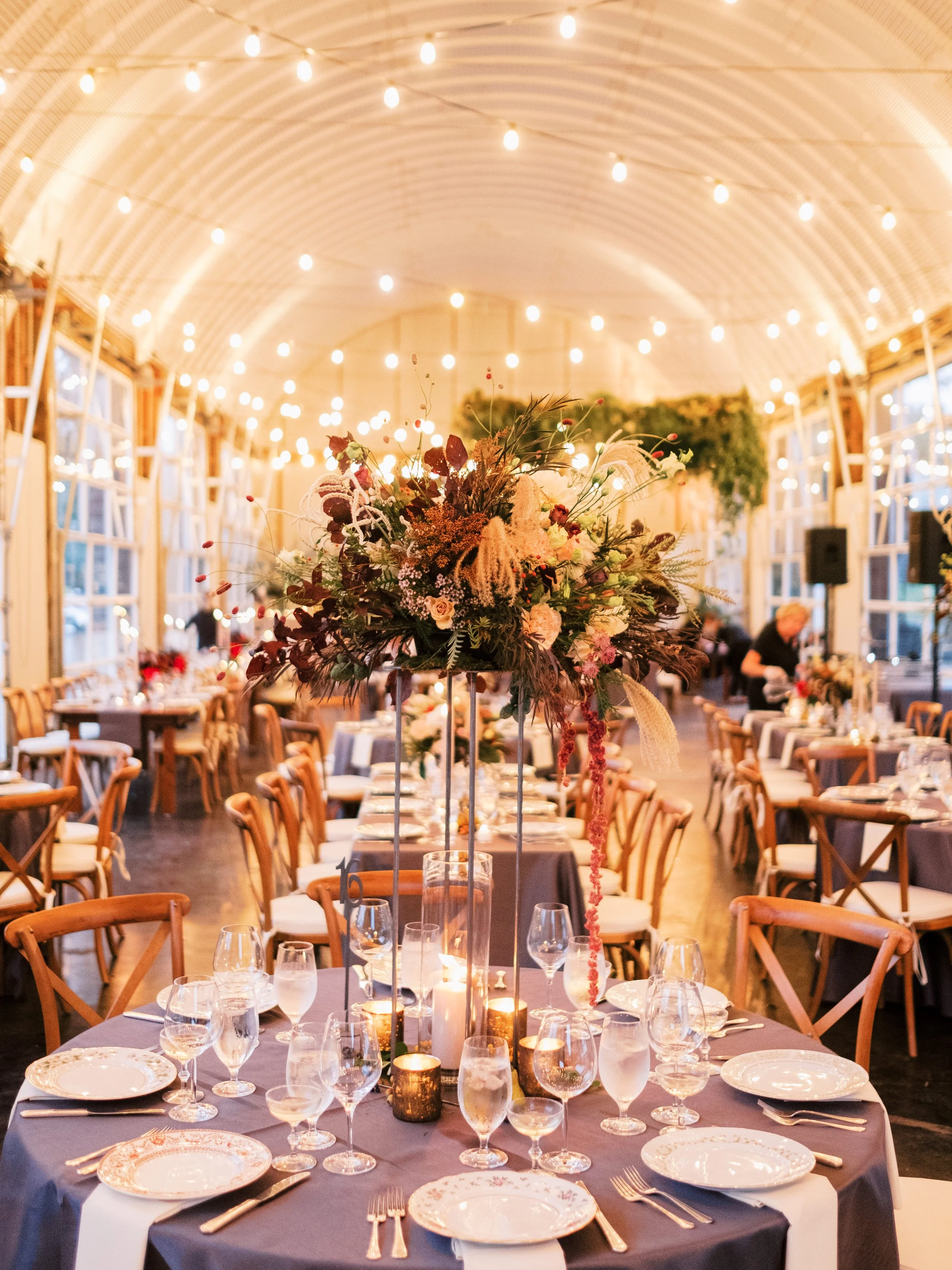Elegant wedding reception table with string lighting