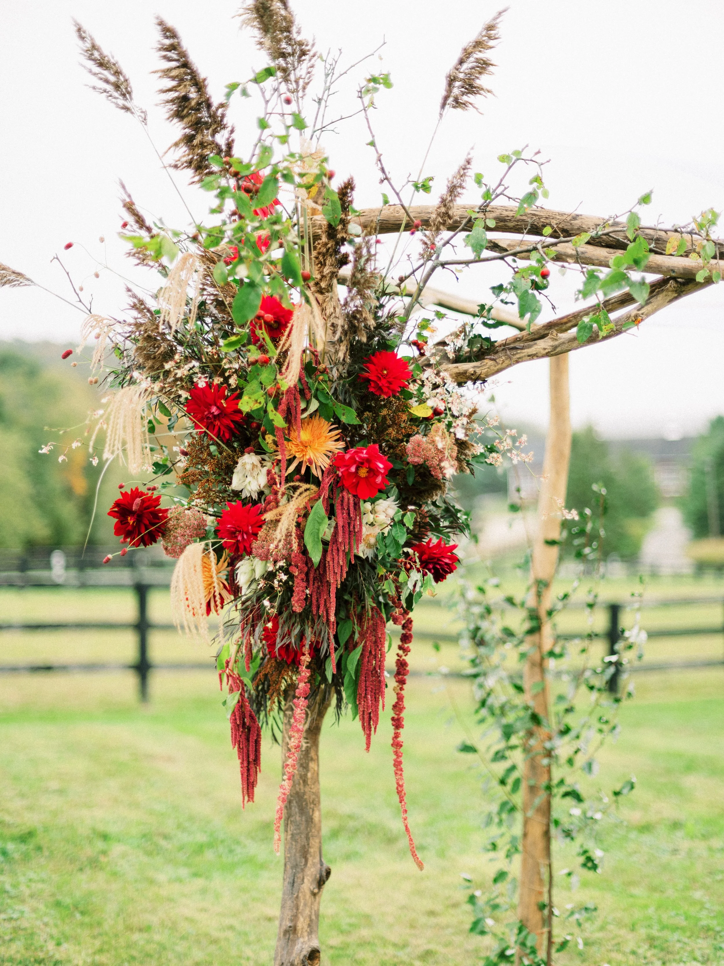 Floral wedding ceremony arch decoration
