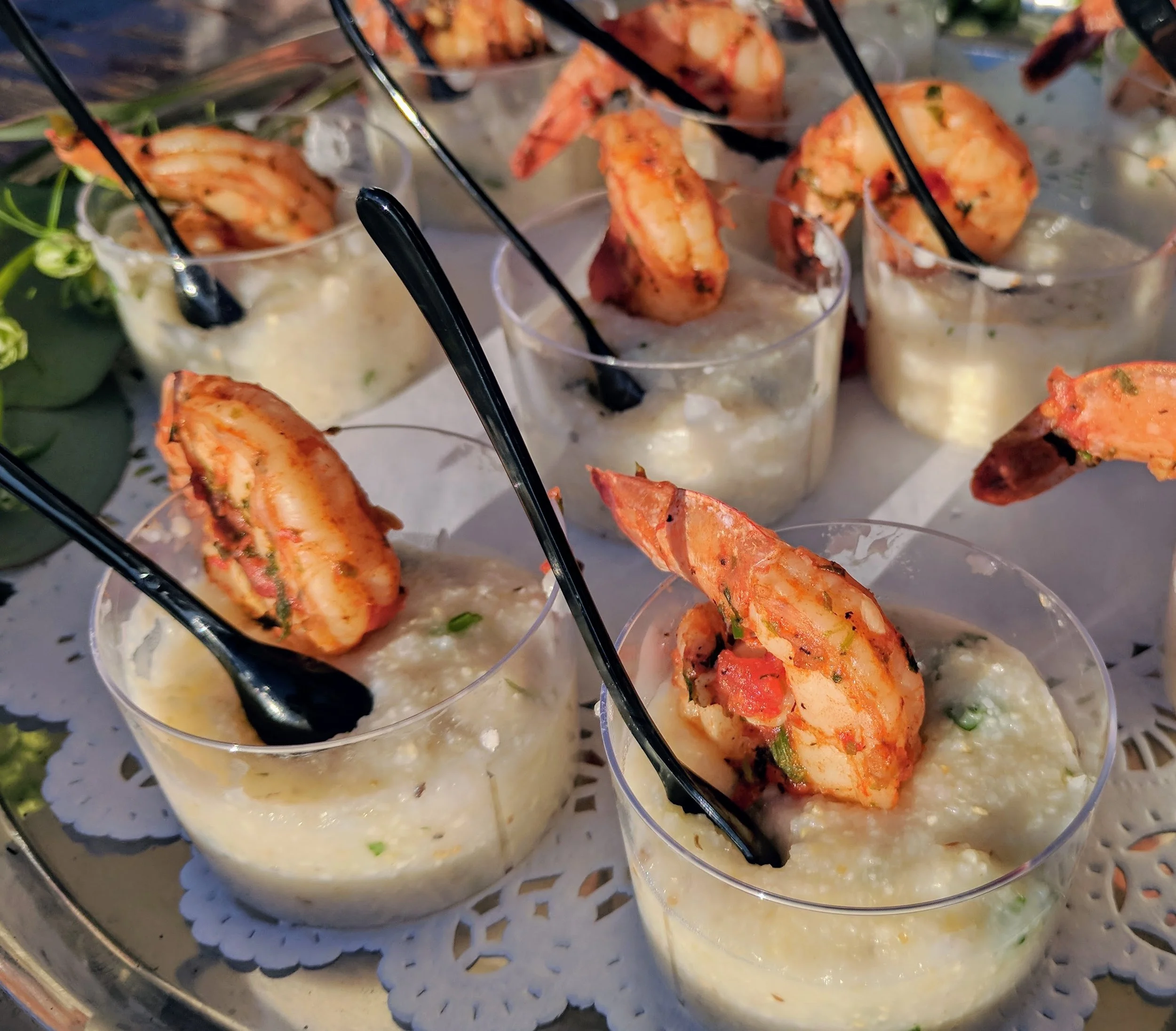 Charcoal-cooked shrimp and grits appetizer, catering food