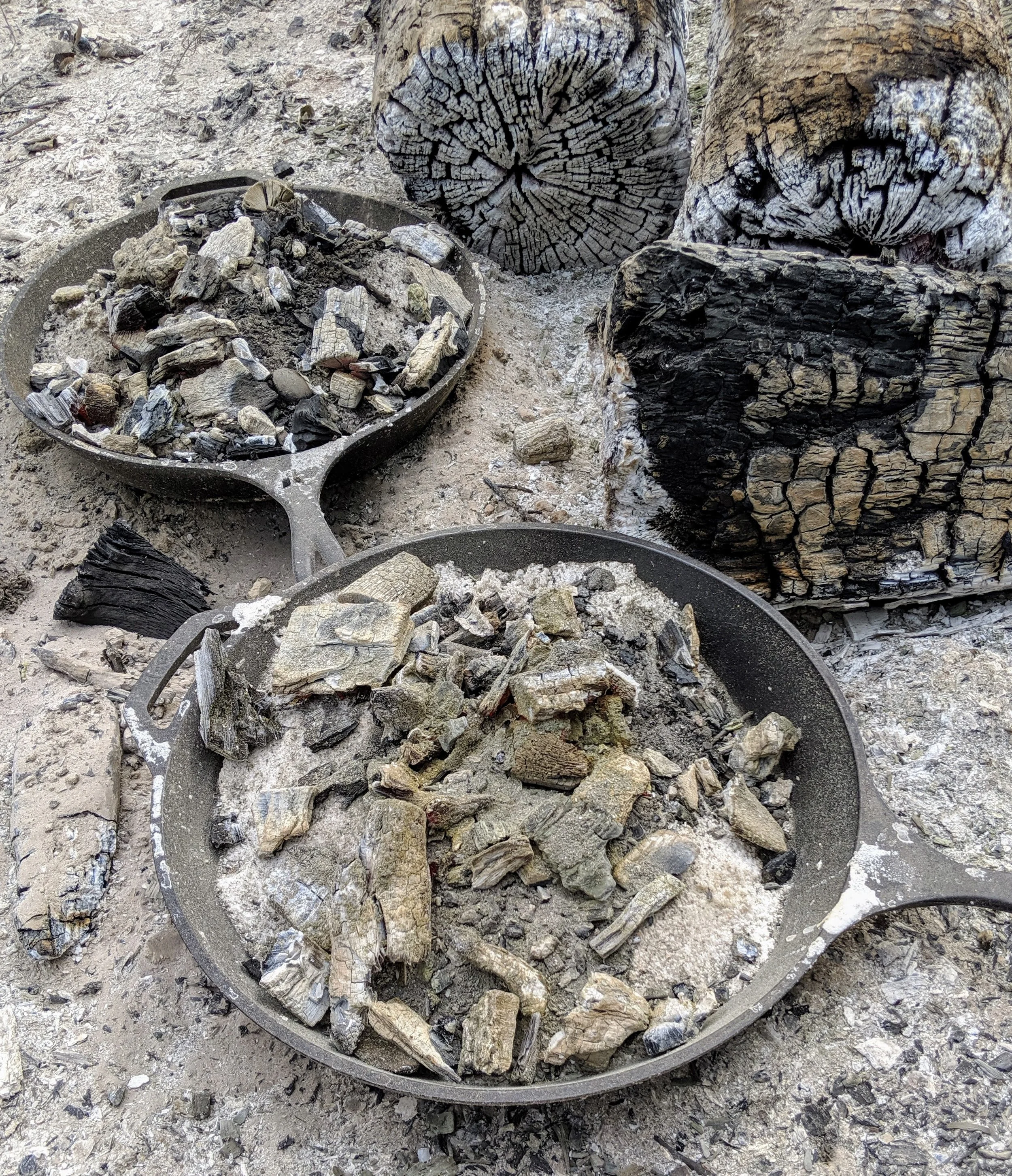 Cast iron salt bake cooking in open-fire pit