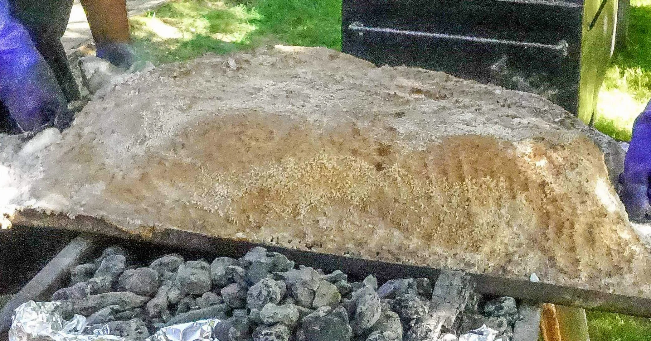 Whole fish salt bake presentation, open-fire BBQ catering