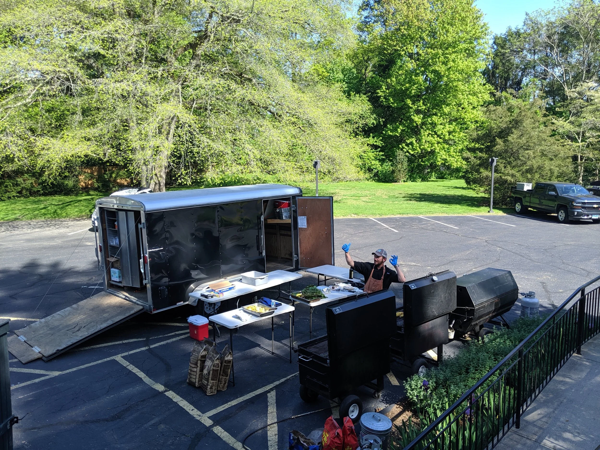 Mobile catering kitchen grill setup outside event venue