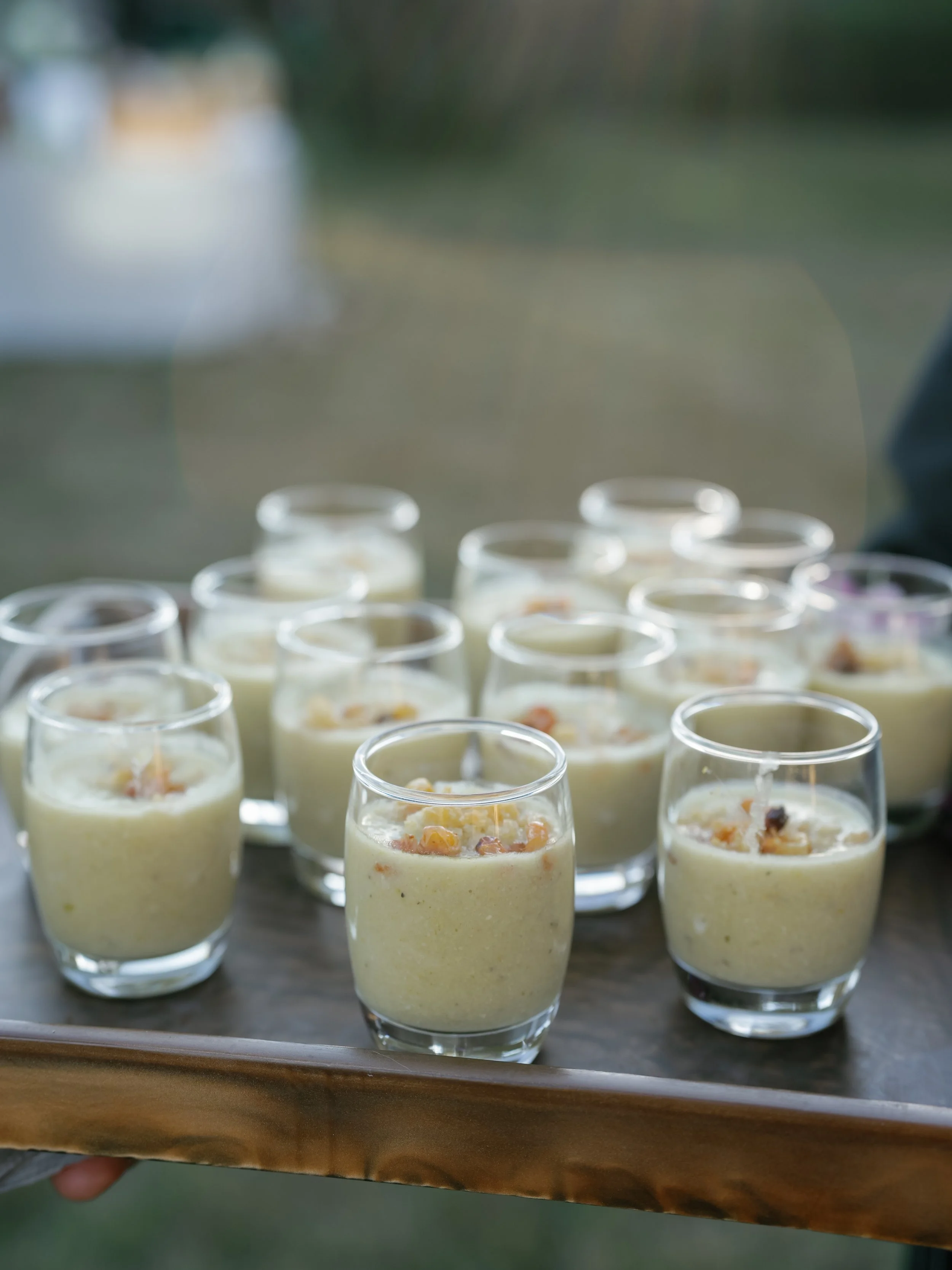 Corn chowder shooter appetizers for wedding catering service