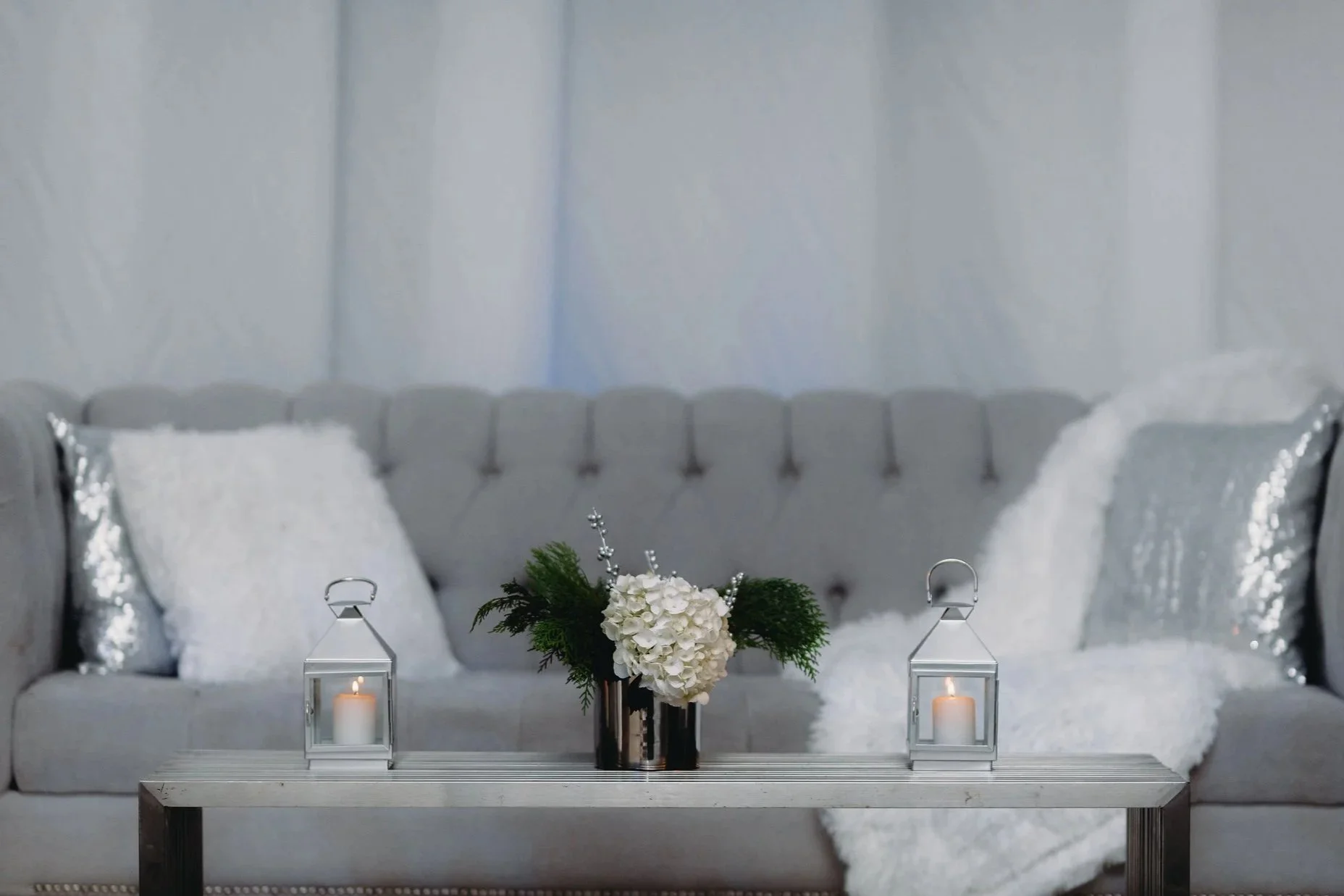 Lounge furniture seating area at wedding reception