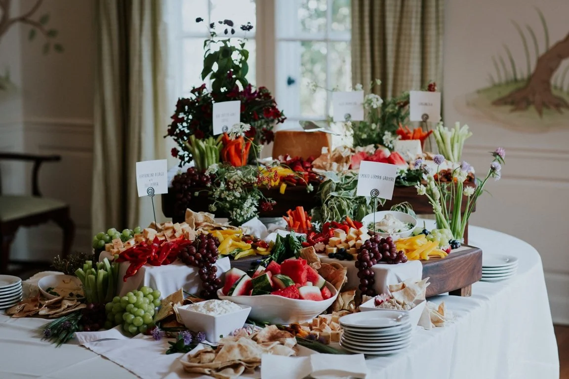 Cheese and charcuterie bounty table for wedding catering