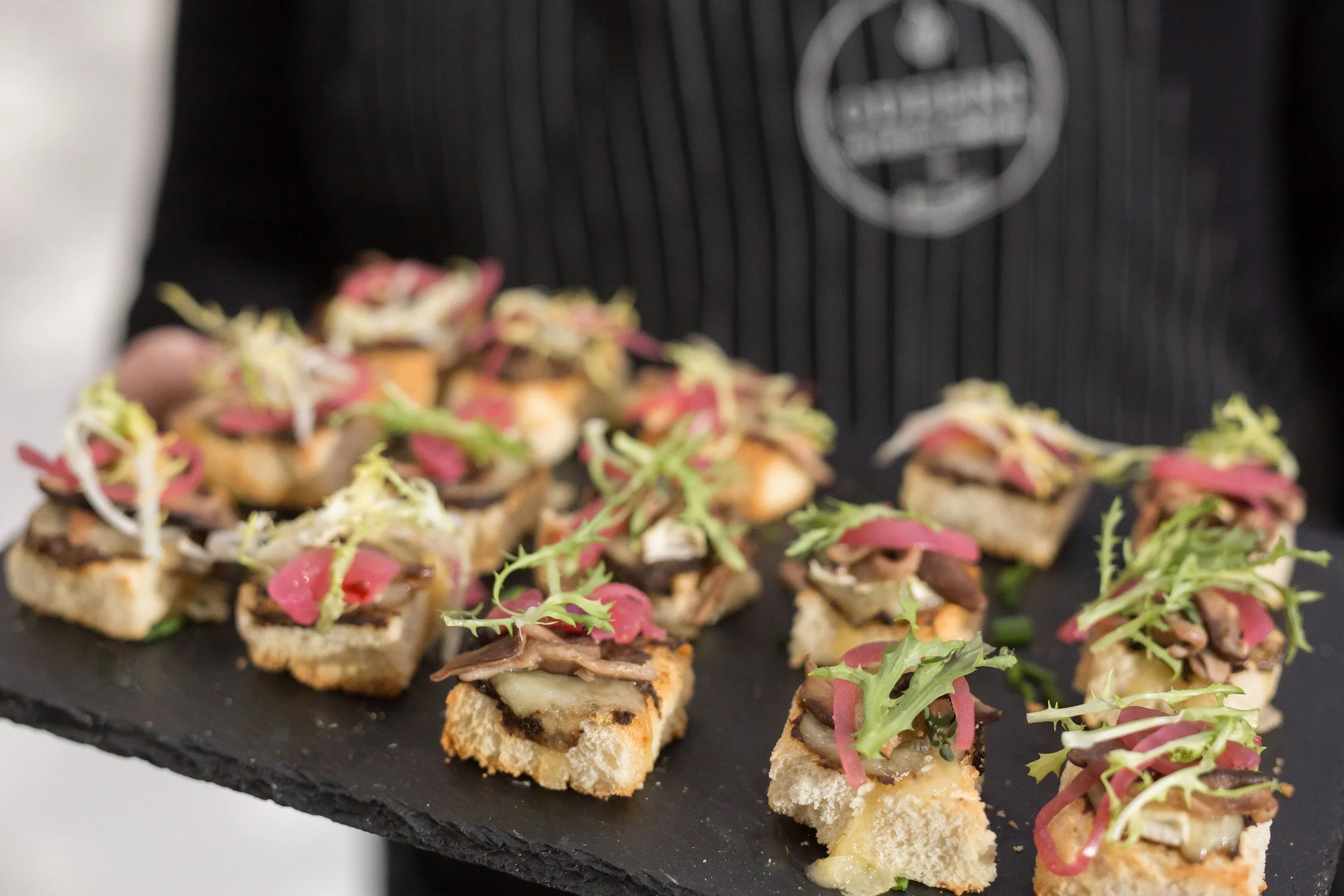 Wild mushroom and brie toast appetizers, vegan catering option