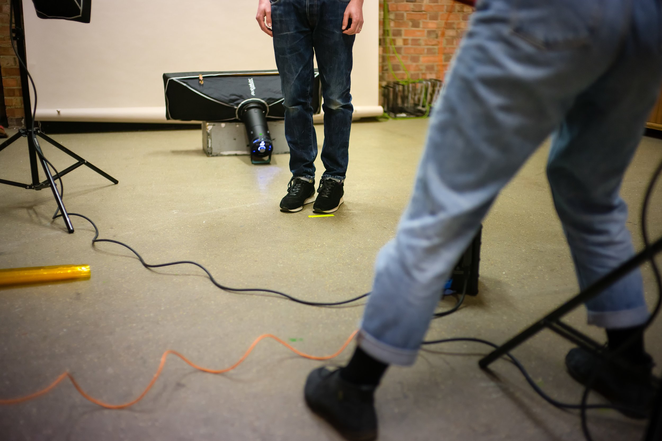 In front of the camera