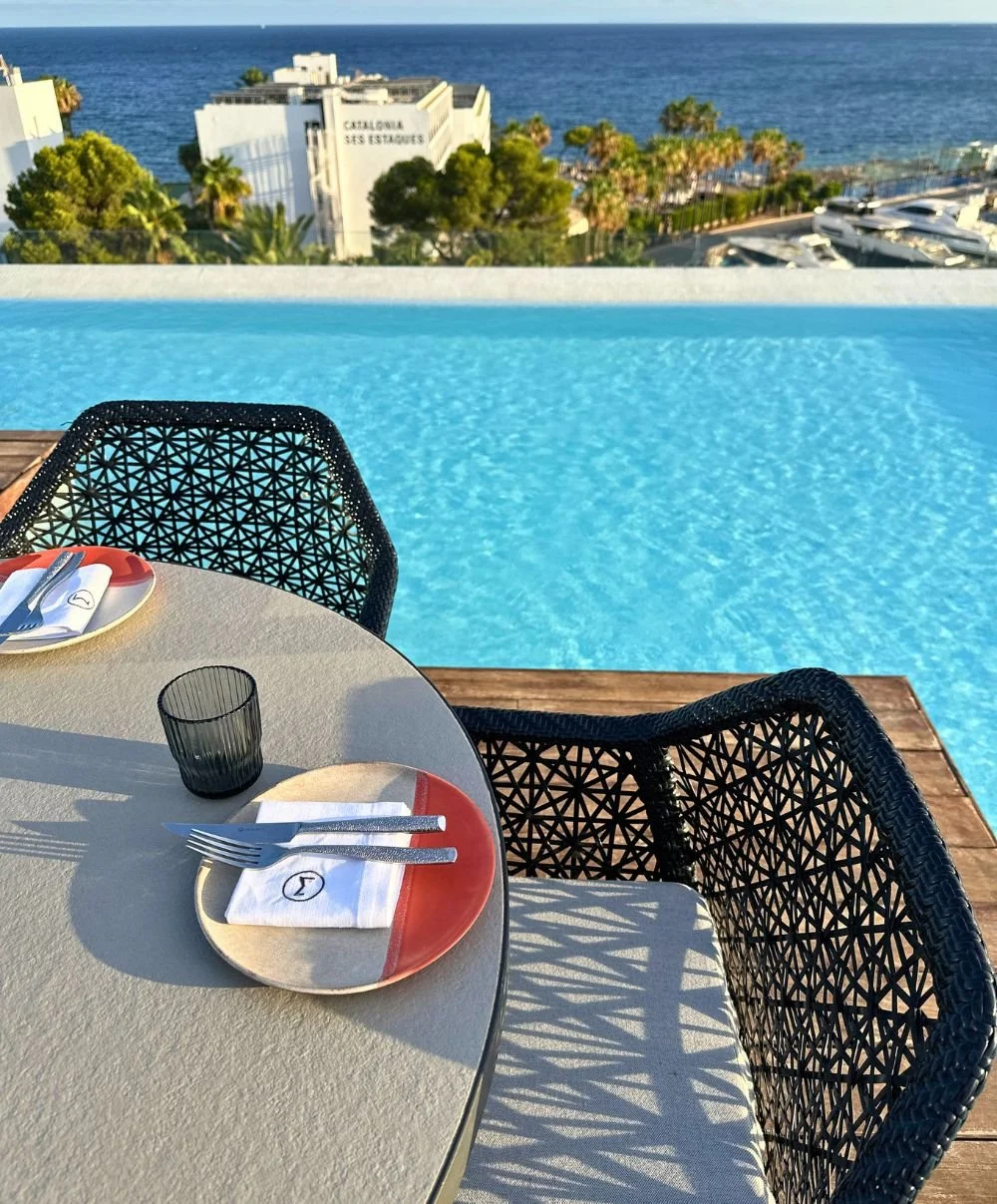 Maymanta table next to pool Aguas de Ibiza.jpg