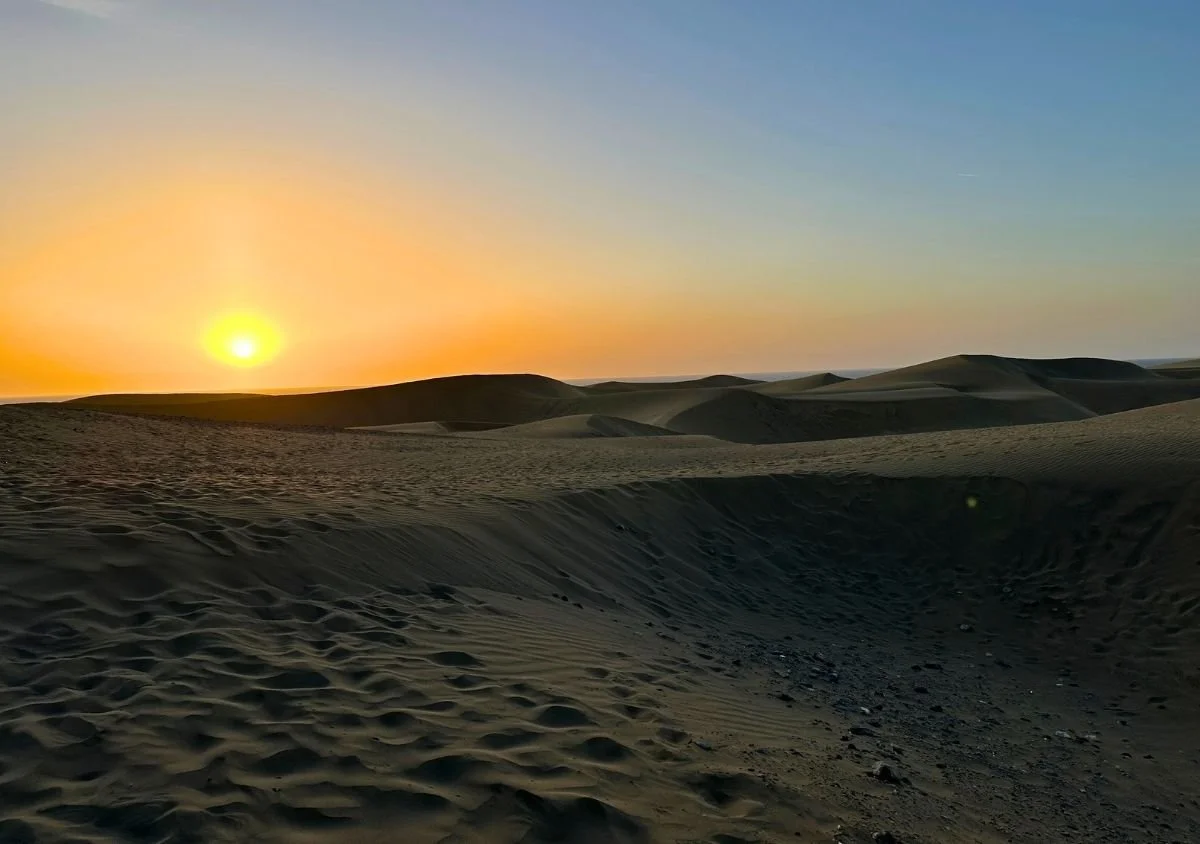 A rising sun over the Dunes of Maspalomas in Gran Canaria