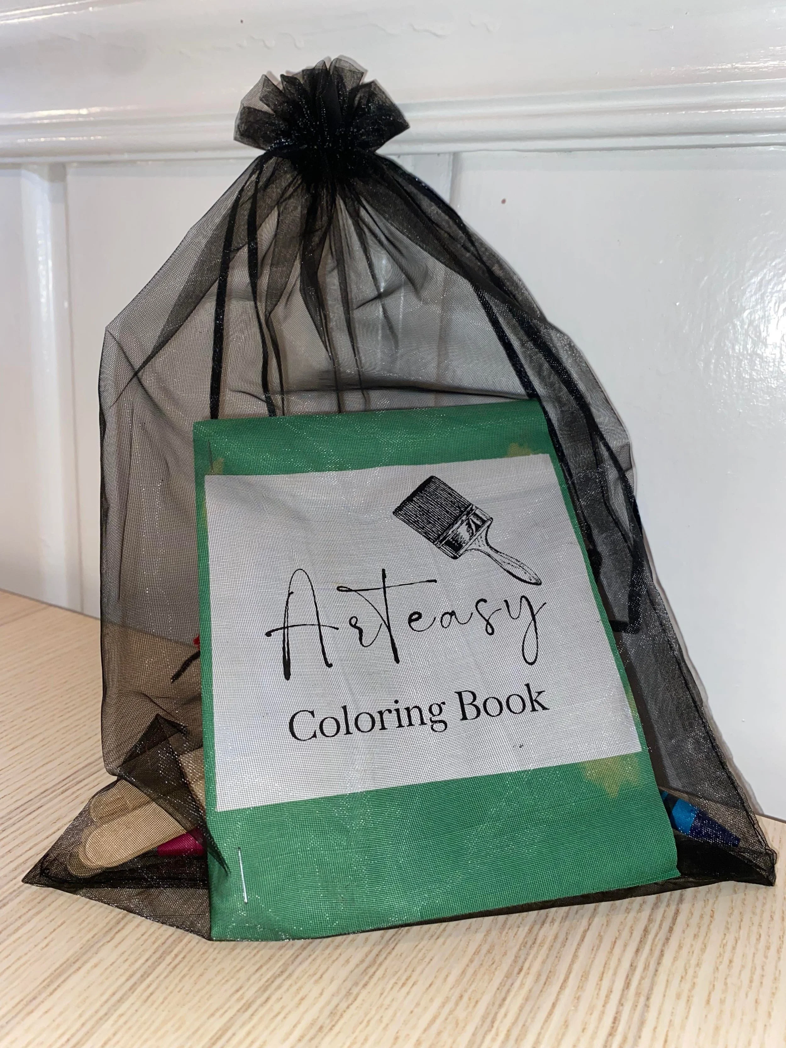 We sold winter themed craft kits at the December holiday market! Supplies and instructions for two crafts and an Arteasy coloring book with crayons included!