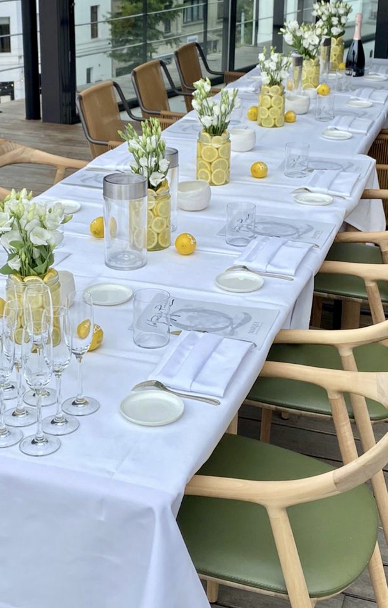     Long table prepared for a private dining experience, bringing Mediterranean hospitality to Belgium.