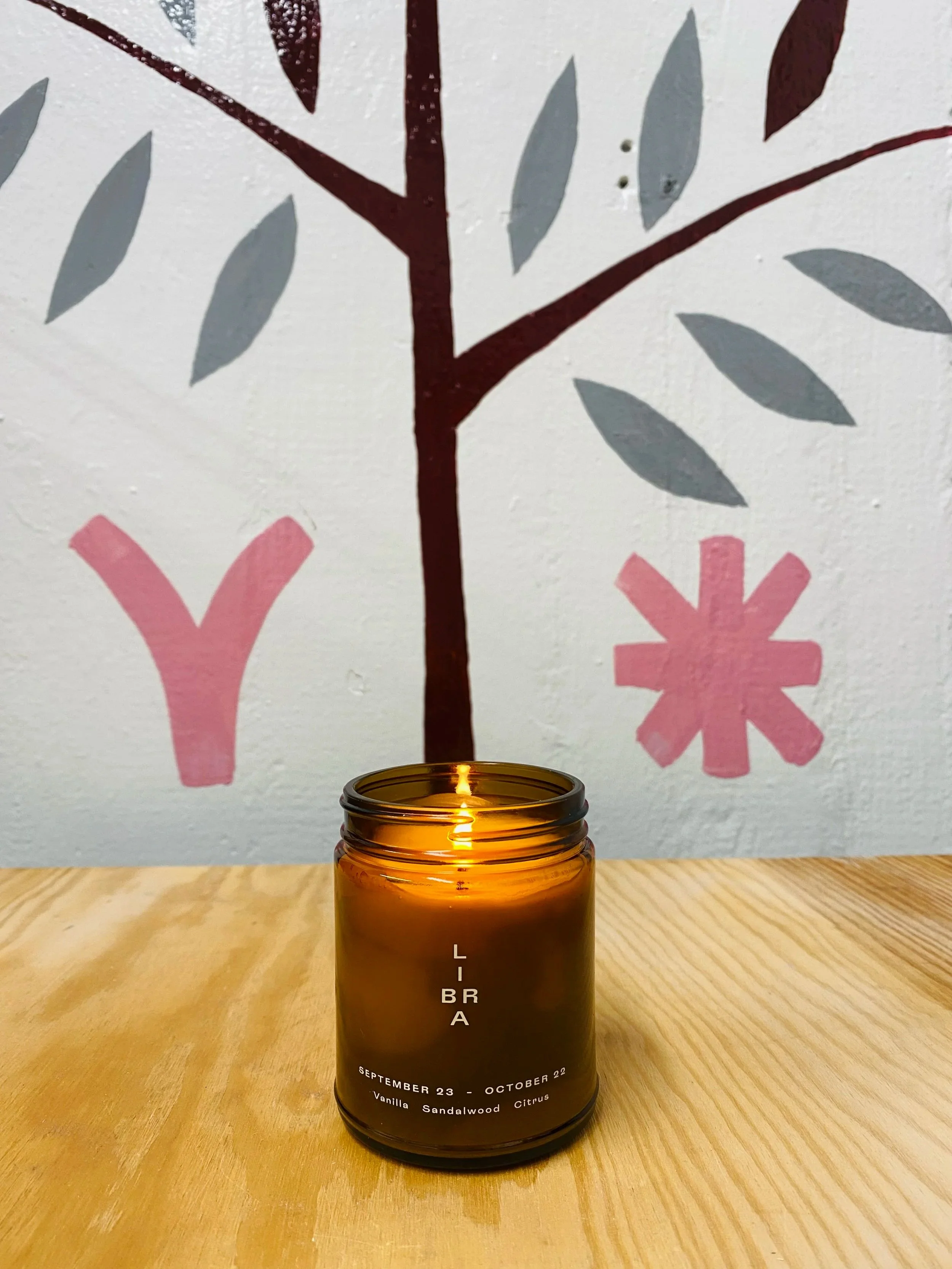 Libra zodiac candle lit