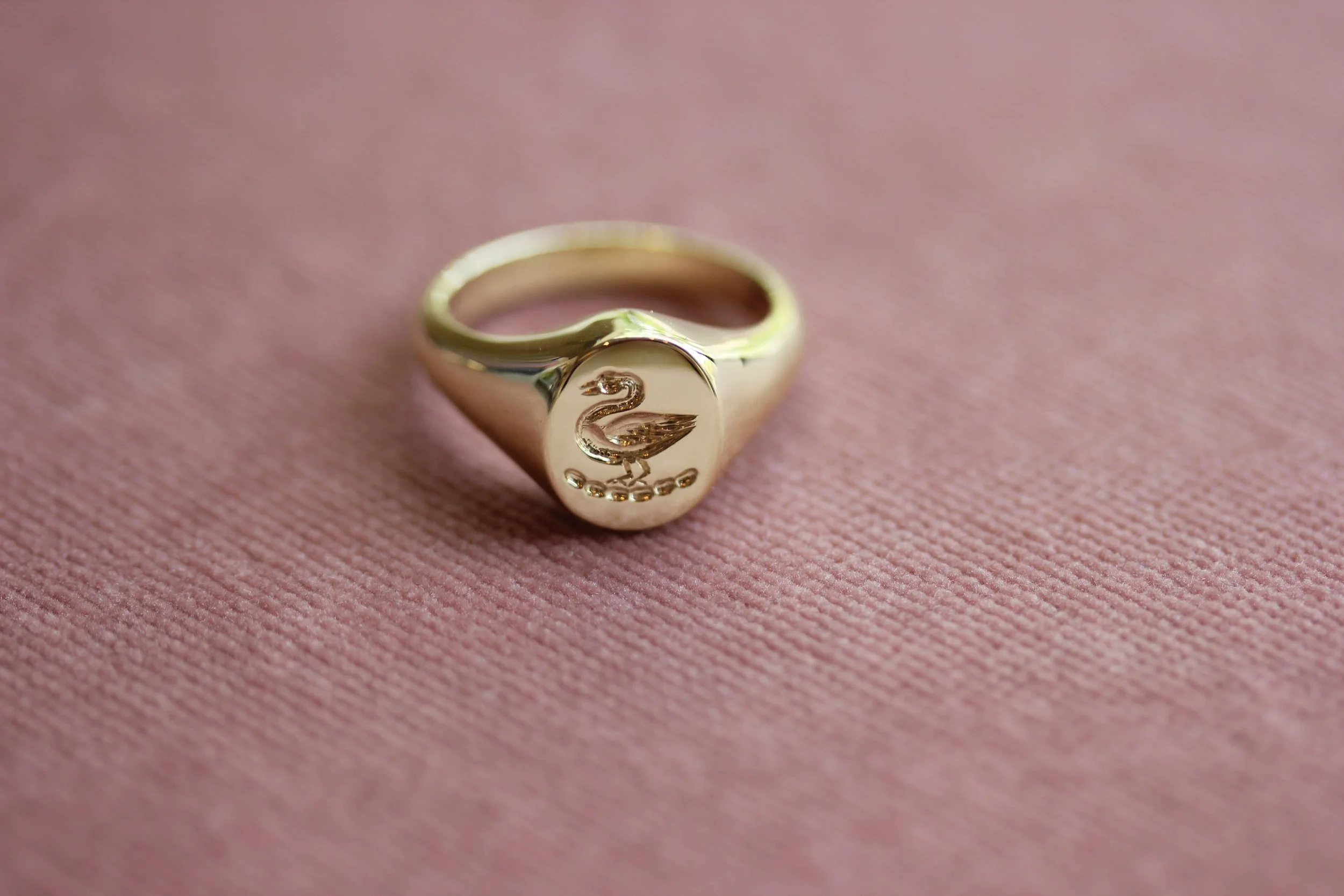gold swan signet ring